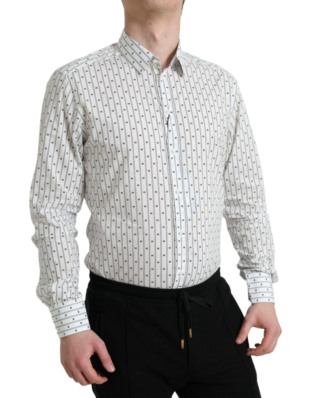 Chemise formelle pour homme Dolce & Gabbana blanche à motif doré, en coton avec col classique et boutons élégants.
