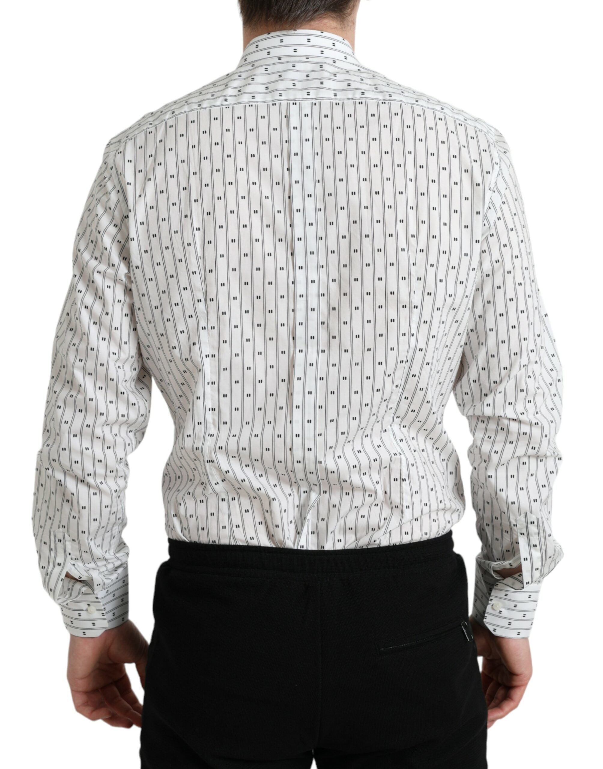 Chemise formelle blanche pour homme Dolce & Gabbana avec motif doré, tissu élégant et détails sophistiqués.