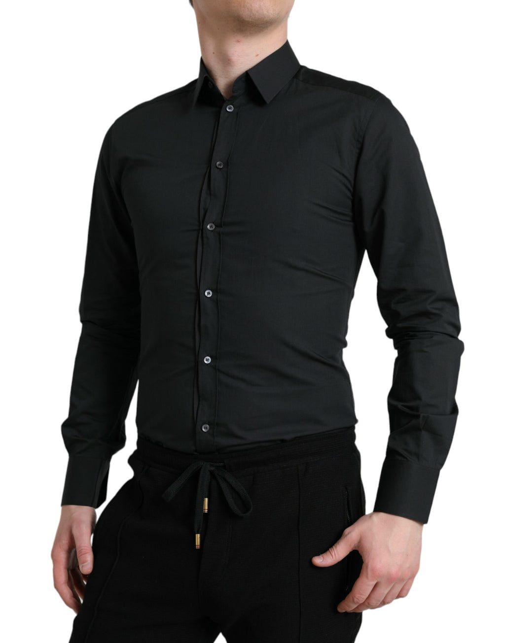 Chemise formelle en coton et soie noire Dolce & Gabbana avec détails dorés, vue de face.