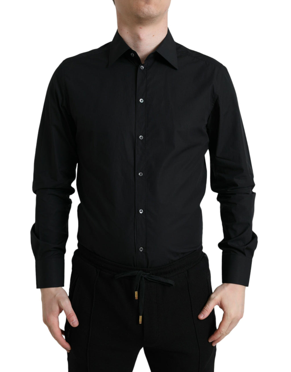 Chemise formelle noire en coton pour homme Dolce & Gabbana avec détails dorés, vue de face.