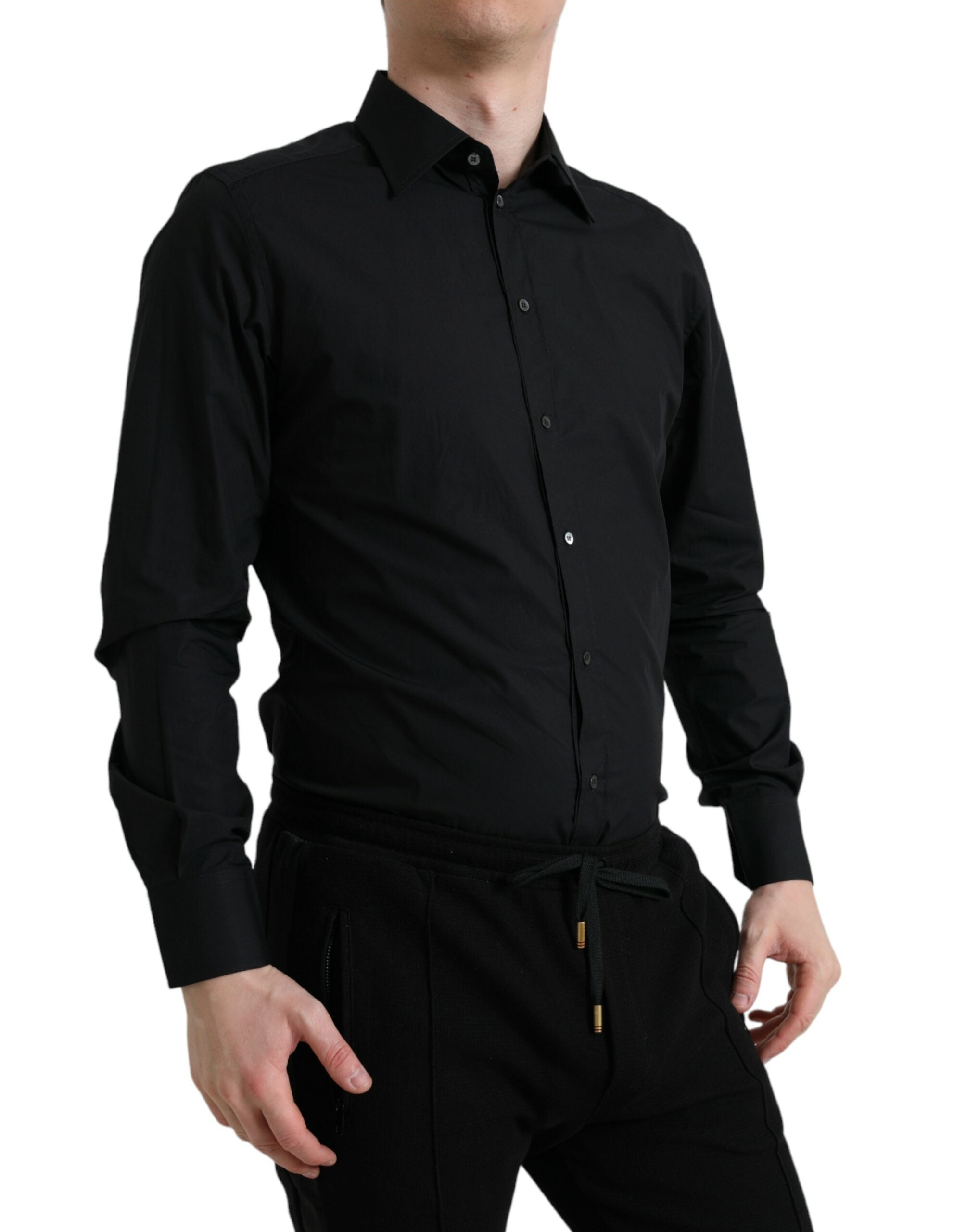 Chemise formelle noire en coton Dolce & Gabbana pour homme avec détails dorés, vue de face sur fond blanc.