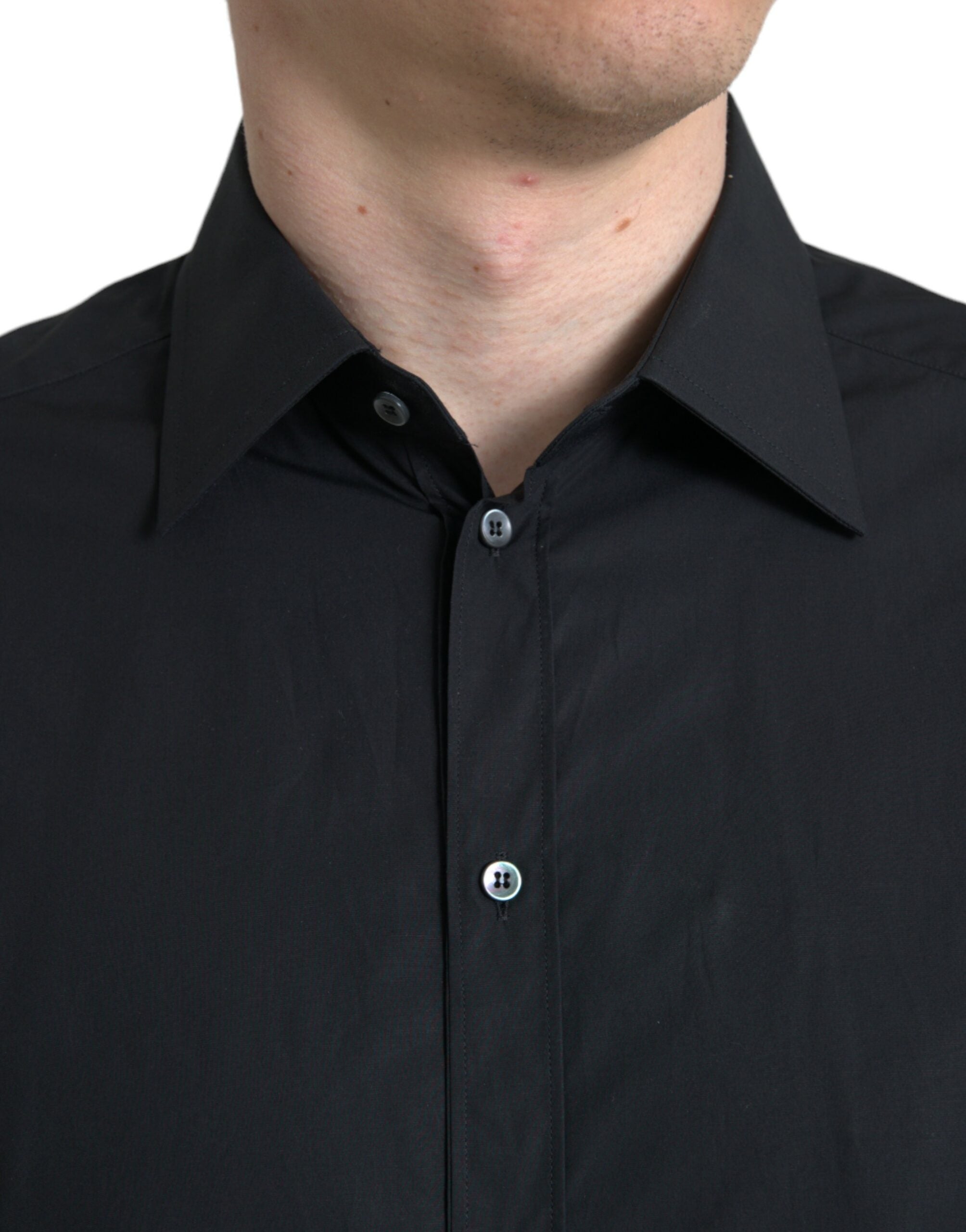 Chemise habillée noire en coton pour homme de Dolce & Gabbana, avec détails dorés et style formel élégant.