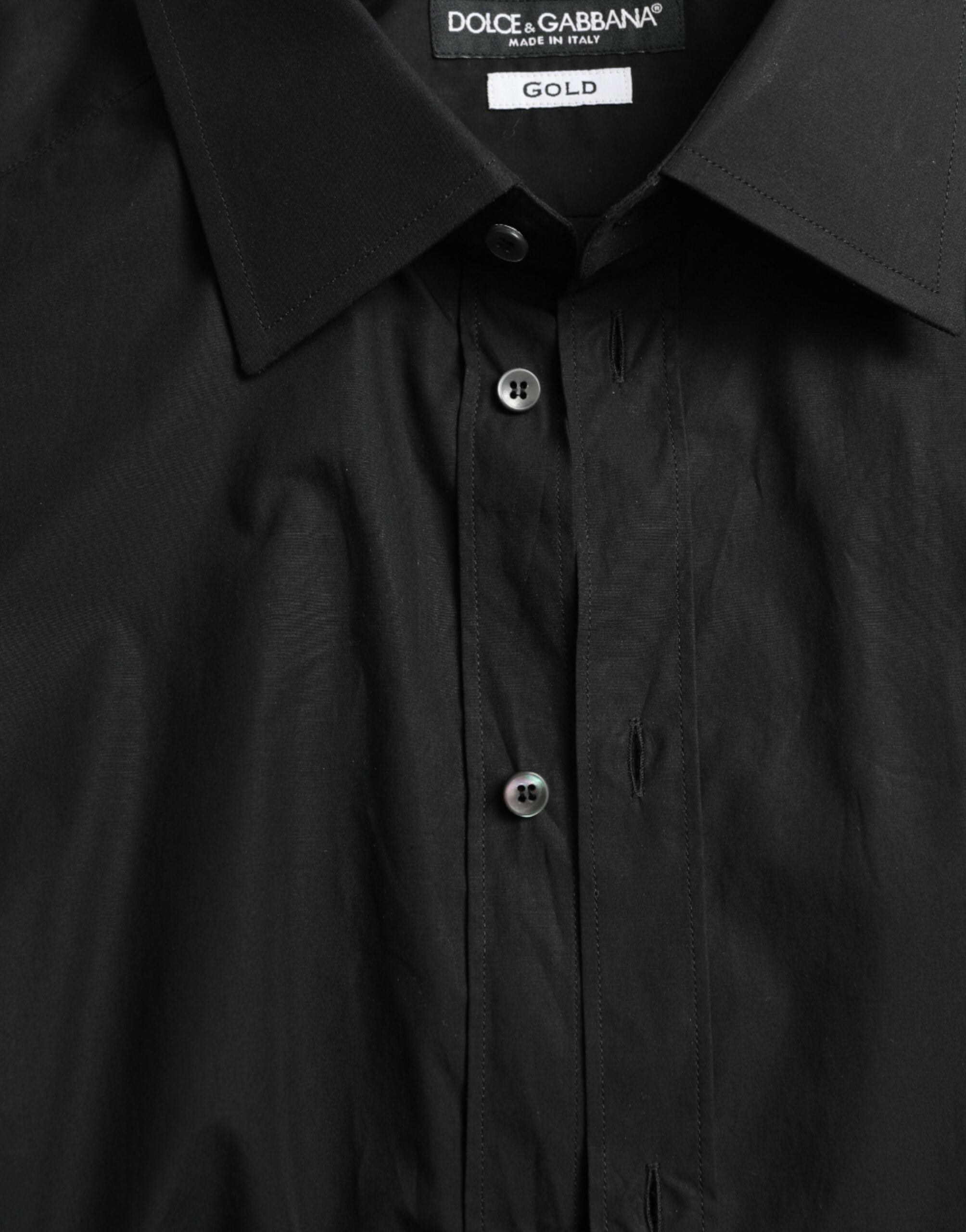Chemise homme noire en coton Dolce & Gabbana, chemise formelle dorée avec boutons, style élégant et sophistiqué.