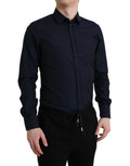 Chemise formelle bleue marine Dolce & Gabbana à coupe slim fit avec détails dorés, vue de face sur mannequin.