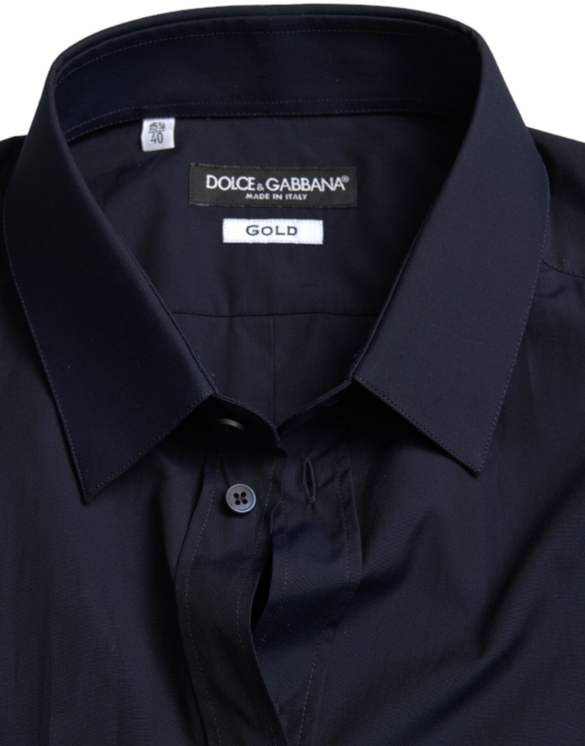 Chemise de costume Dolce & Gabbana bleu marine, coupe slim fit, en tissu élégant avec détails dorés.