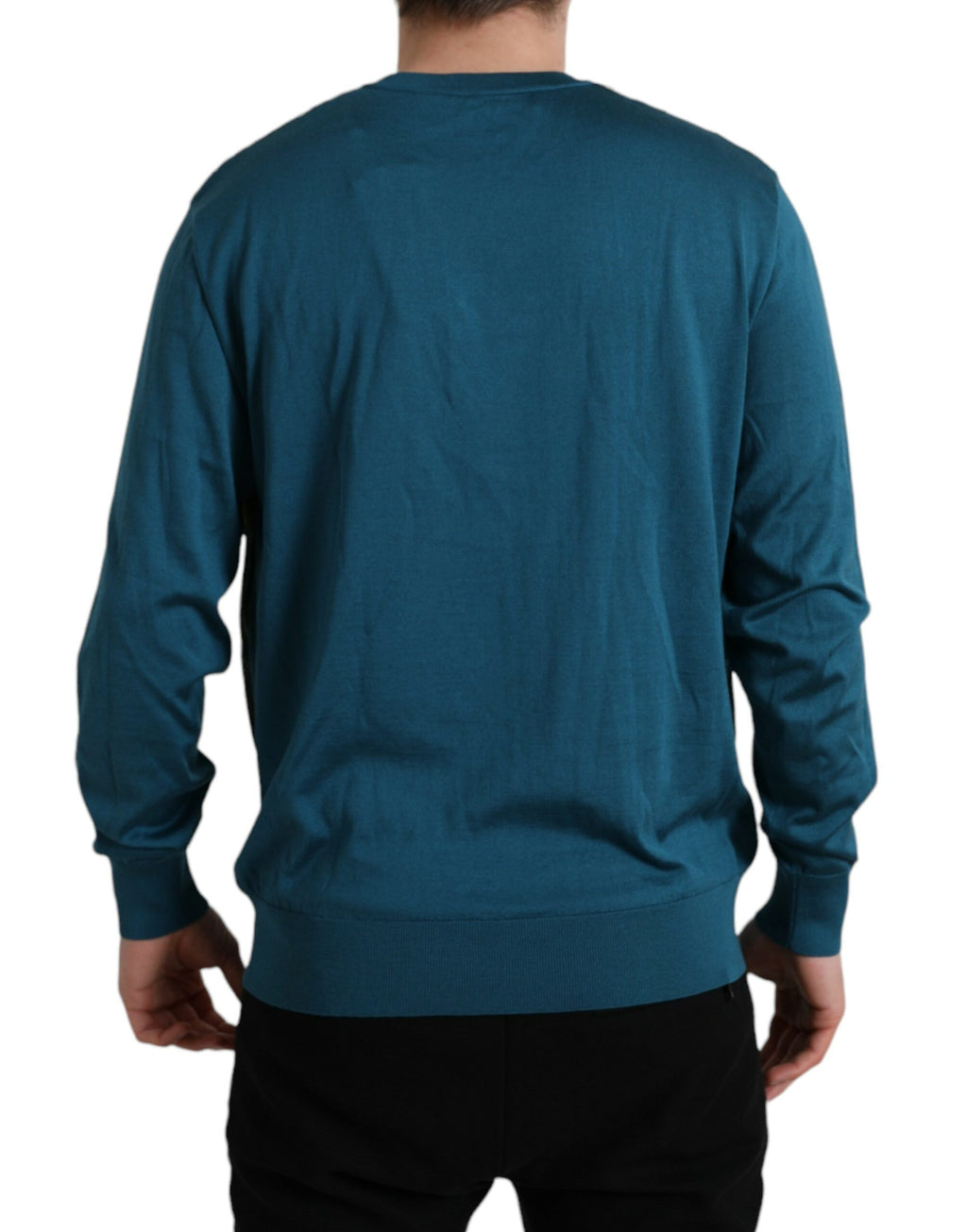 Pull Dolce & Gabbana vert avec motif de plumes de paon, douce maille à manches longues.