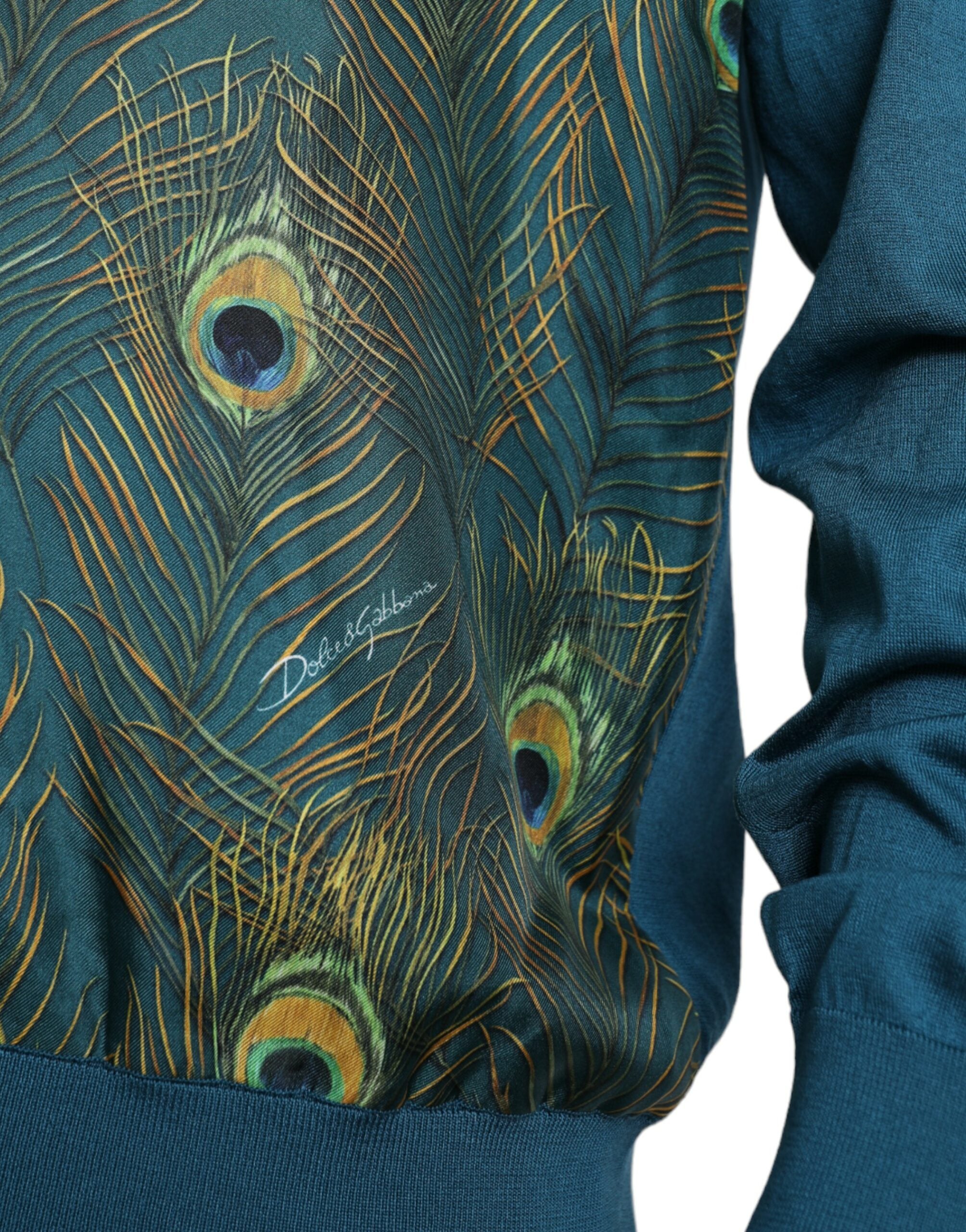 Pull Dolce & Gabbana vert avec motif plumes de paon, pull en laine, vue de face.