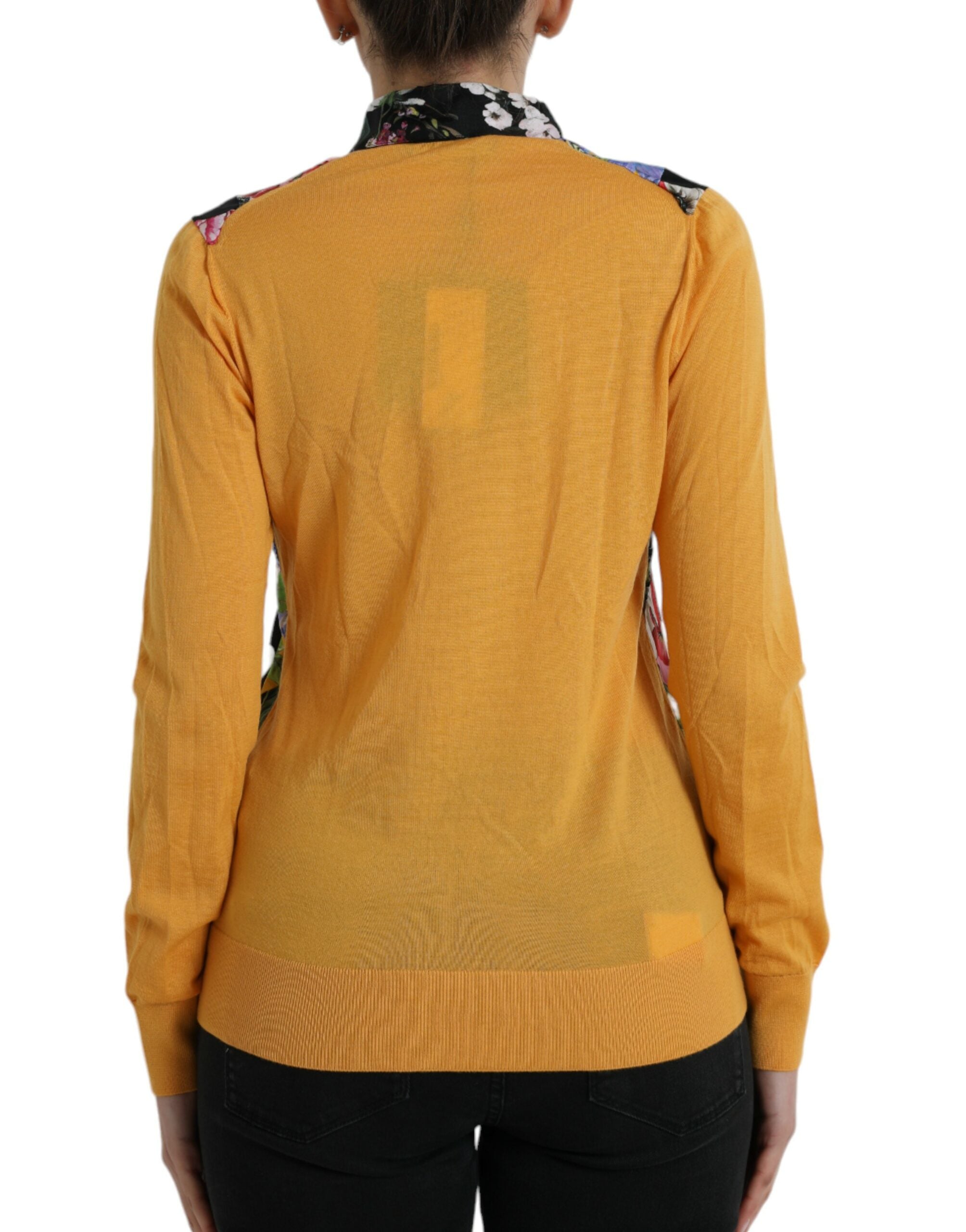 Pull Dolce & Gabbana en cachemire patchwork multicolore, col Henley, à motifs colorés et texturés.