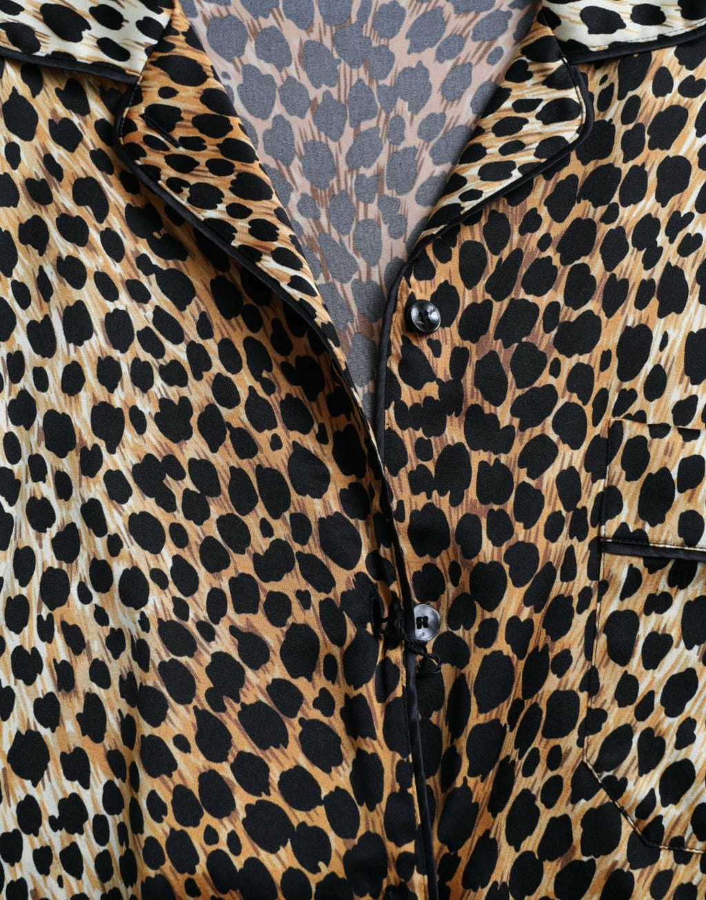 Chemise Dolce & Gabbana à manches longues avec imprimé léopard marron, style élégant et sophistiqué.