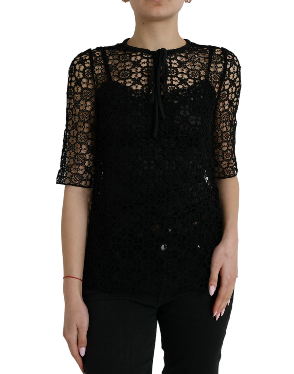 Blouse Dolce & Gabbana en dentelle noire à manches courtes avec motif floral, élégante et raffinée.