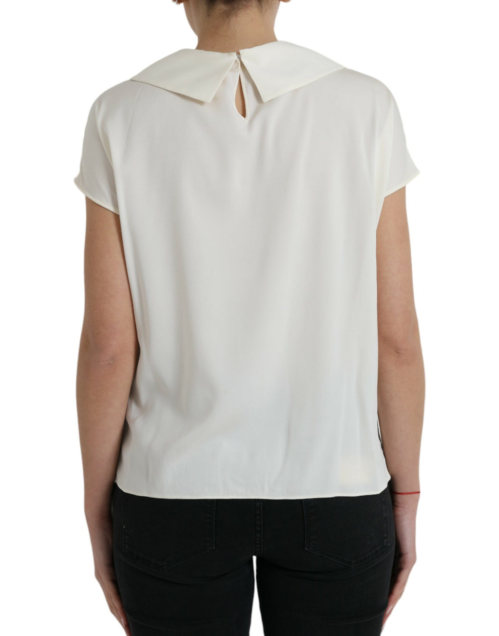 Top court en soie blanche Dolce & Gabbana avec finition en dentelle, manches courtes élégantes et style sophistiqué.