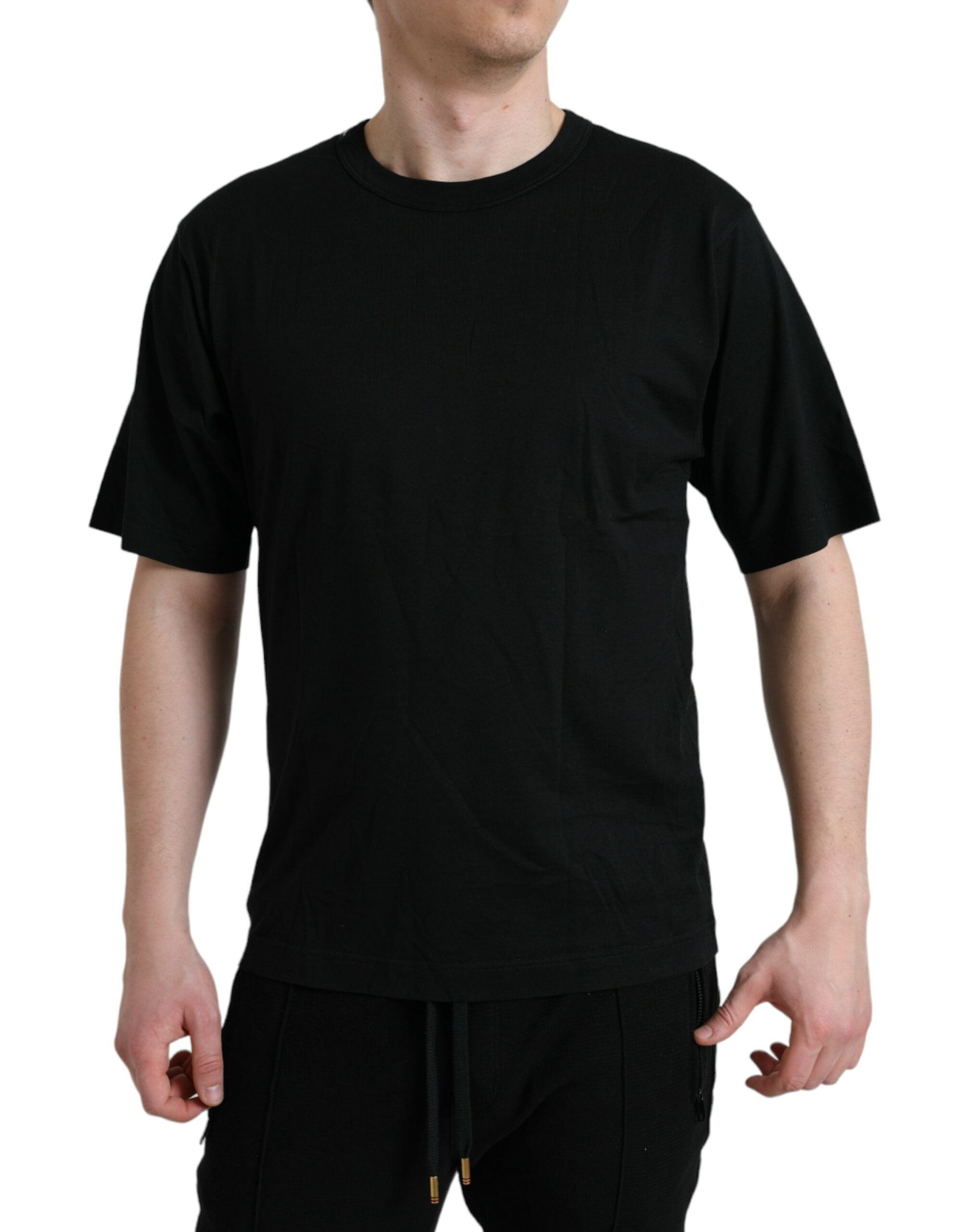 T-shirt noir Dolce & Gabbana à logo embossé, col rond et manches courtes, vue de face.