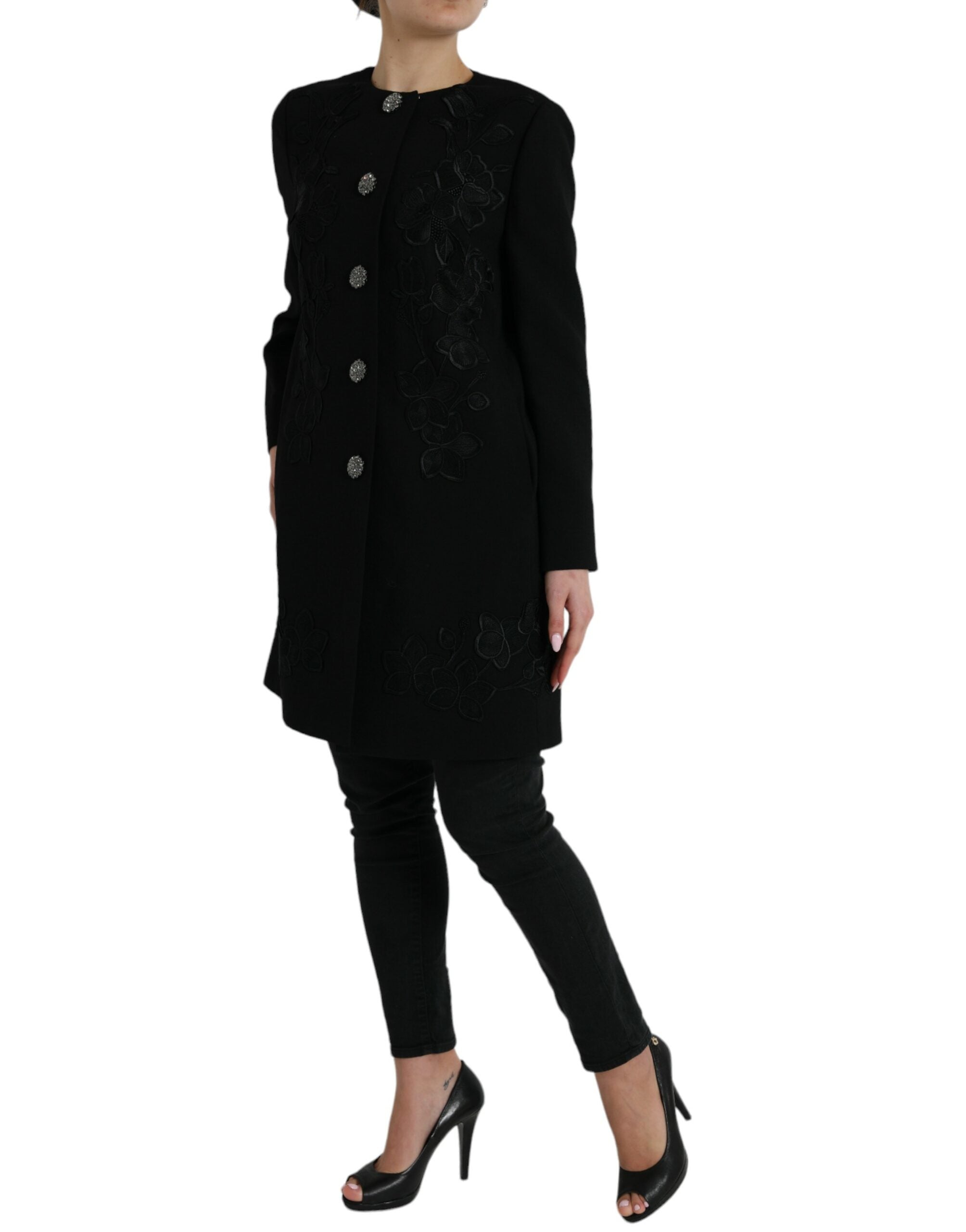Veste en laine noire Dolce & Gabbana avec motifs floraux, boutons décoratifs et détails élégants.