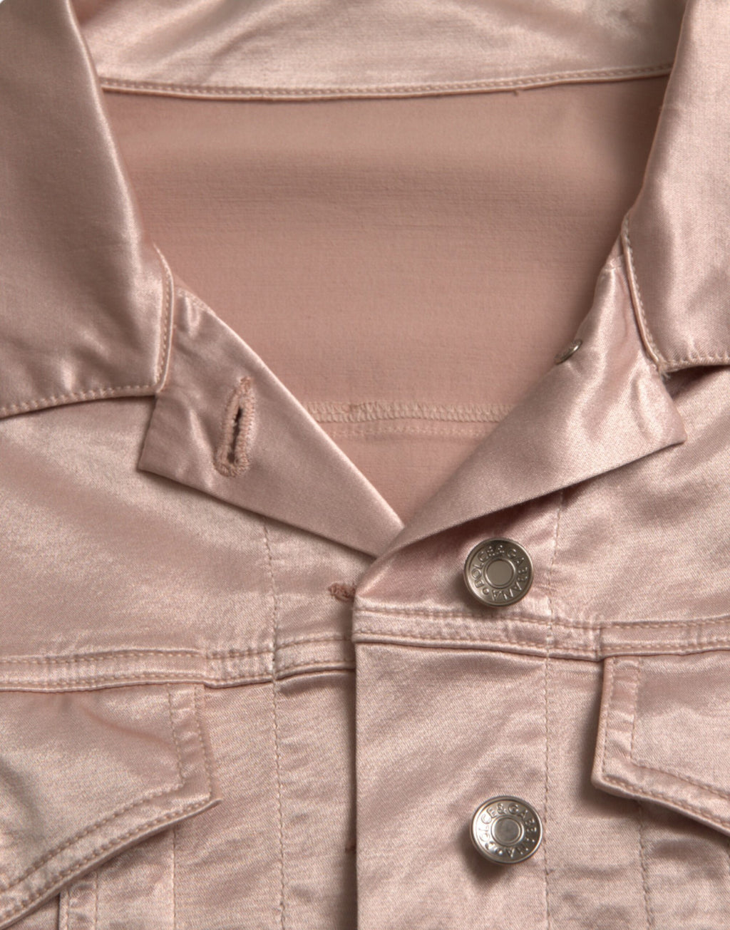 Veste courte en coton stretch rose Dolce & Gabbana avec col, vue de face sur fond blanc.