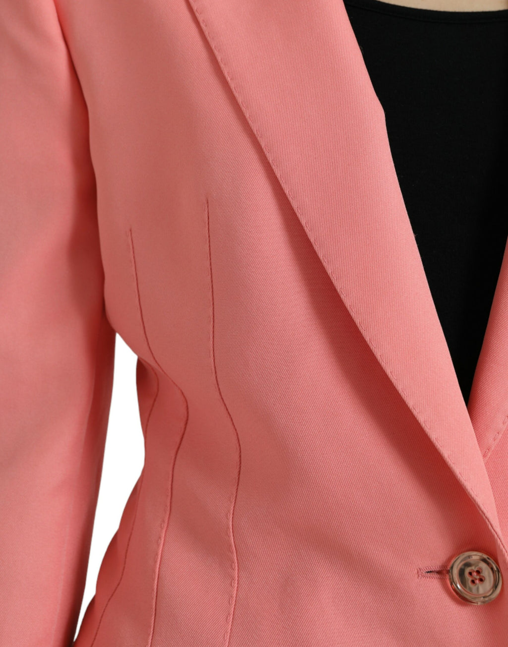 Veste blazer rose en polyester à double boutonnage de Dolce & Gabbana, vue de face sur un fond neutre.