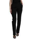 Pantalon tapered en laine noire Dolce & Gabbana à taille moyenne, vue de face, élégant et ajusté.