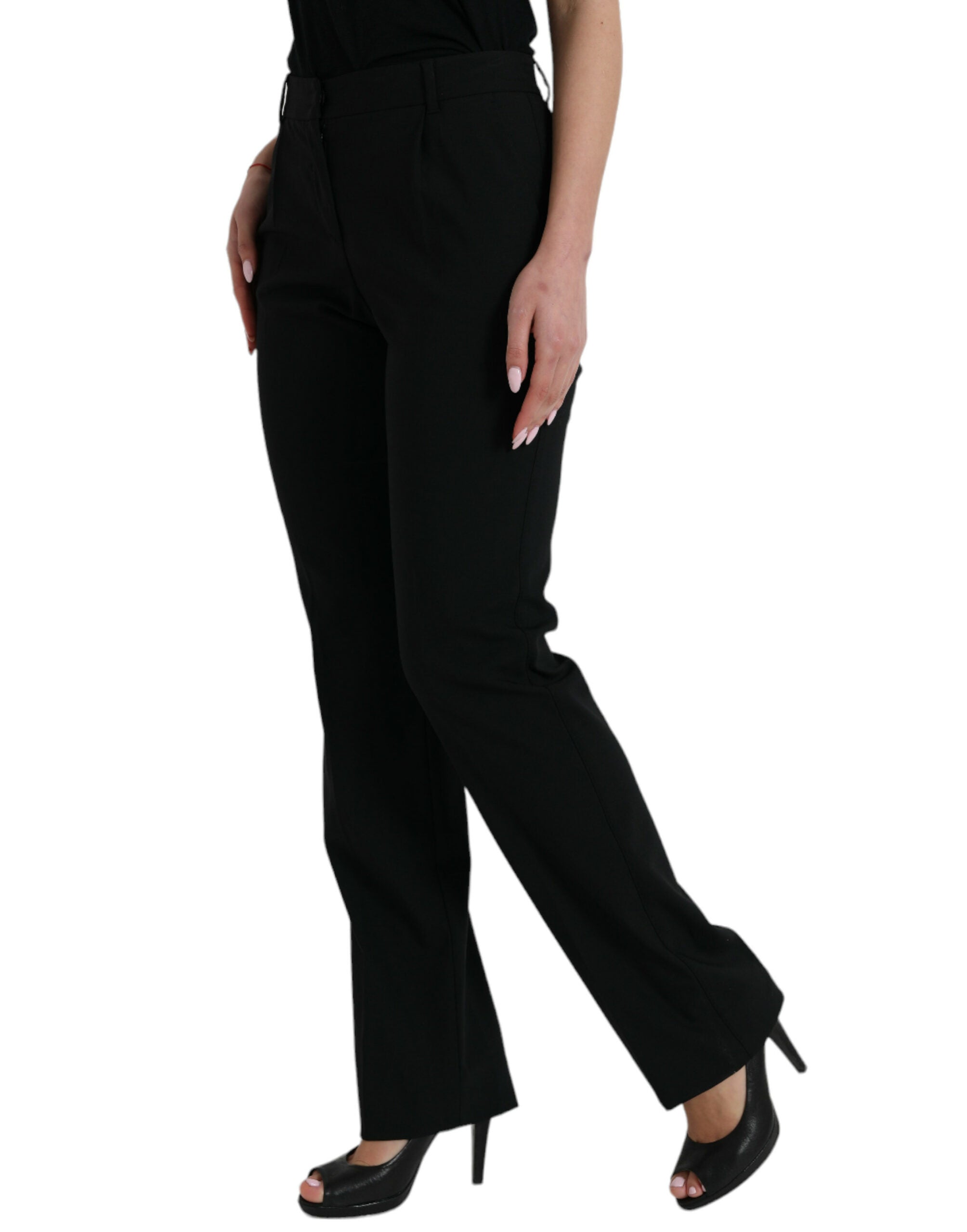 Pantalon en laine noire Dolce & Gabbana, coupe tapered à taille moyenne, détails élégants visibles sur l'image.