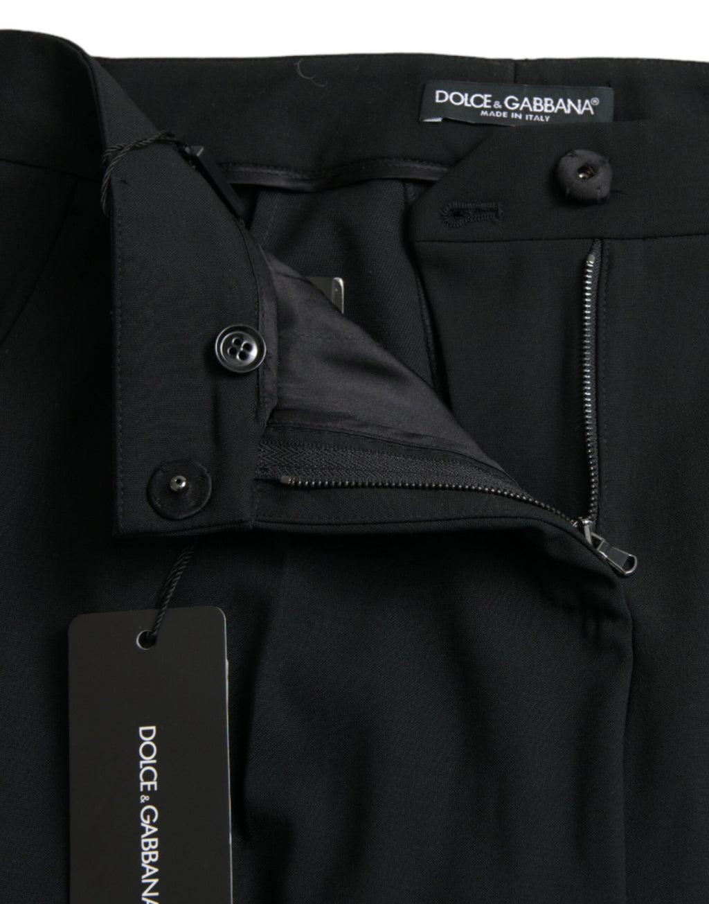 Pantalon noir en laine Dolce & Gabbana, taille mi-haute, coupe tapered, vue d'ensemble sur le produit.