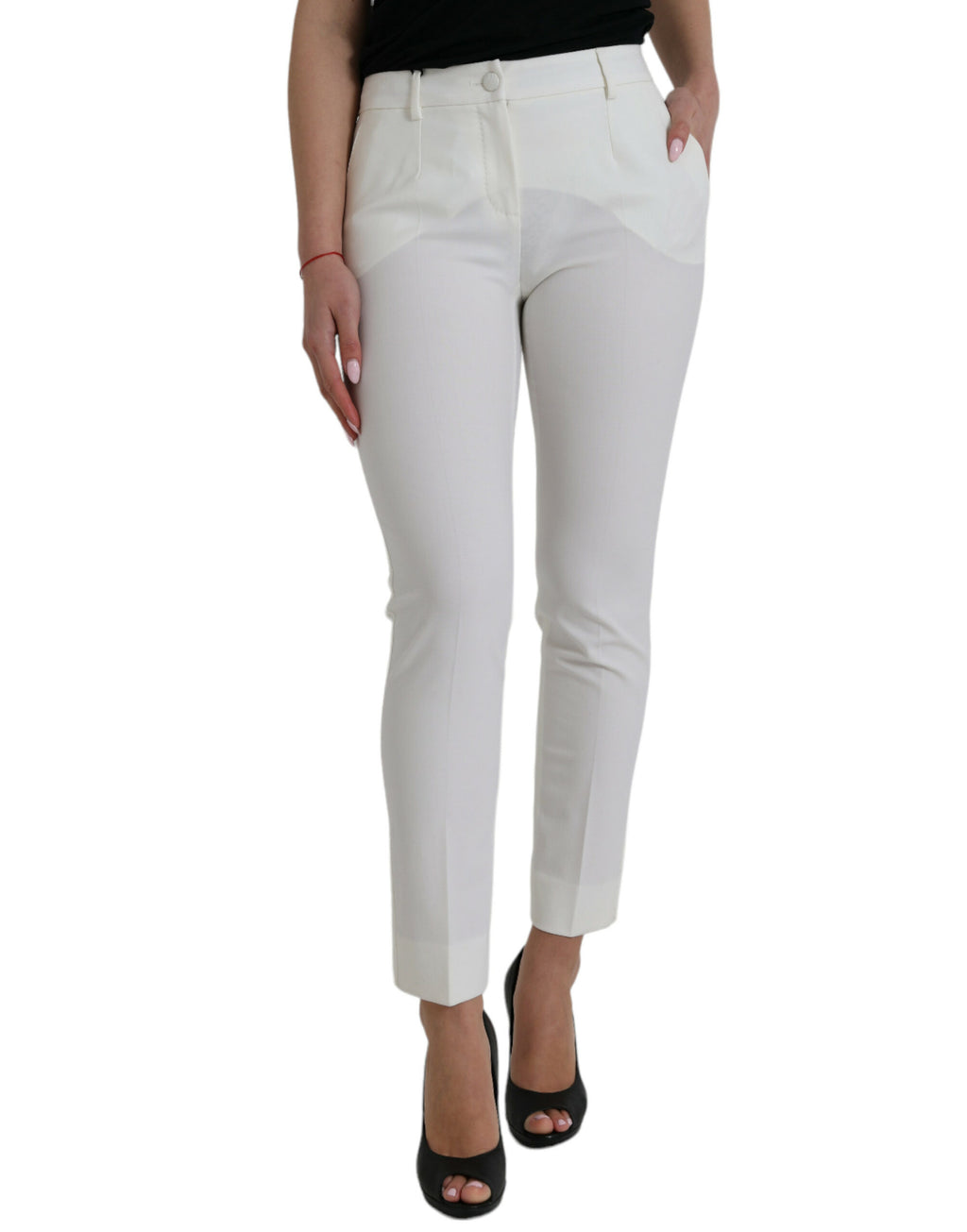 Pantalons en laine blanche Dolce & Gabbana, taille mi-haute, coupe tapered, élégants et modernes, visibles sur l'image.