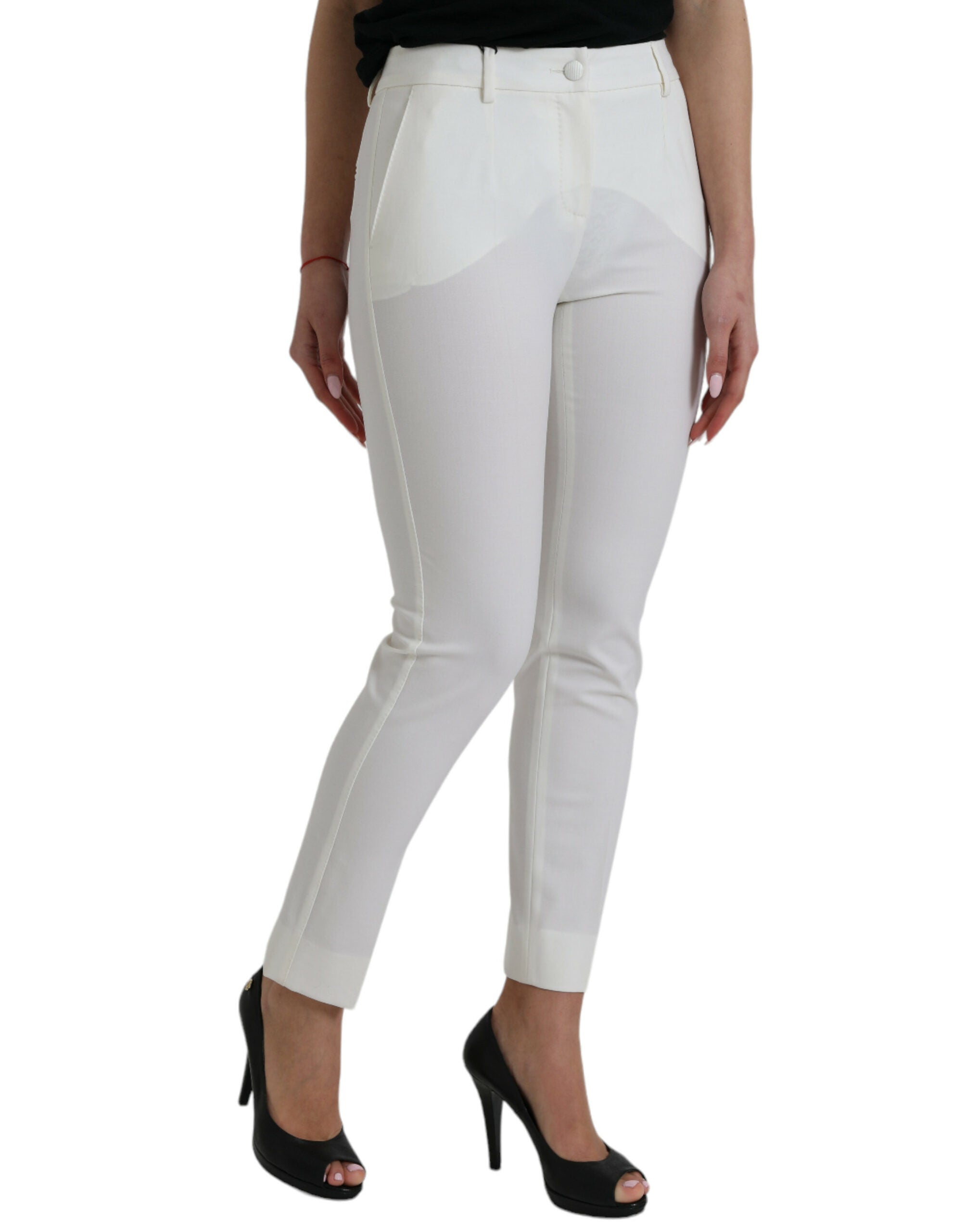 Pantalon en laine blanche Dolce & Gabbana, taille mi-haute, coupe tapered, vue montrant la texture douce et la coupe élégante.