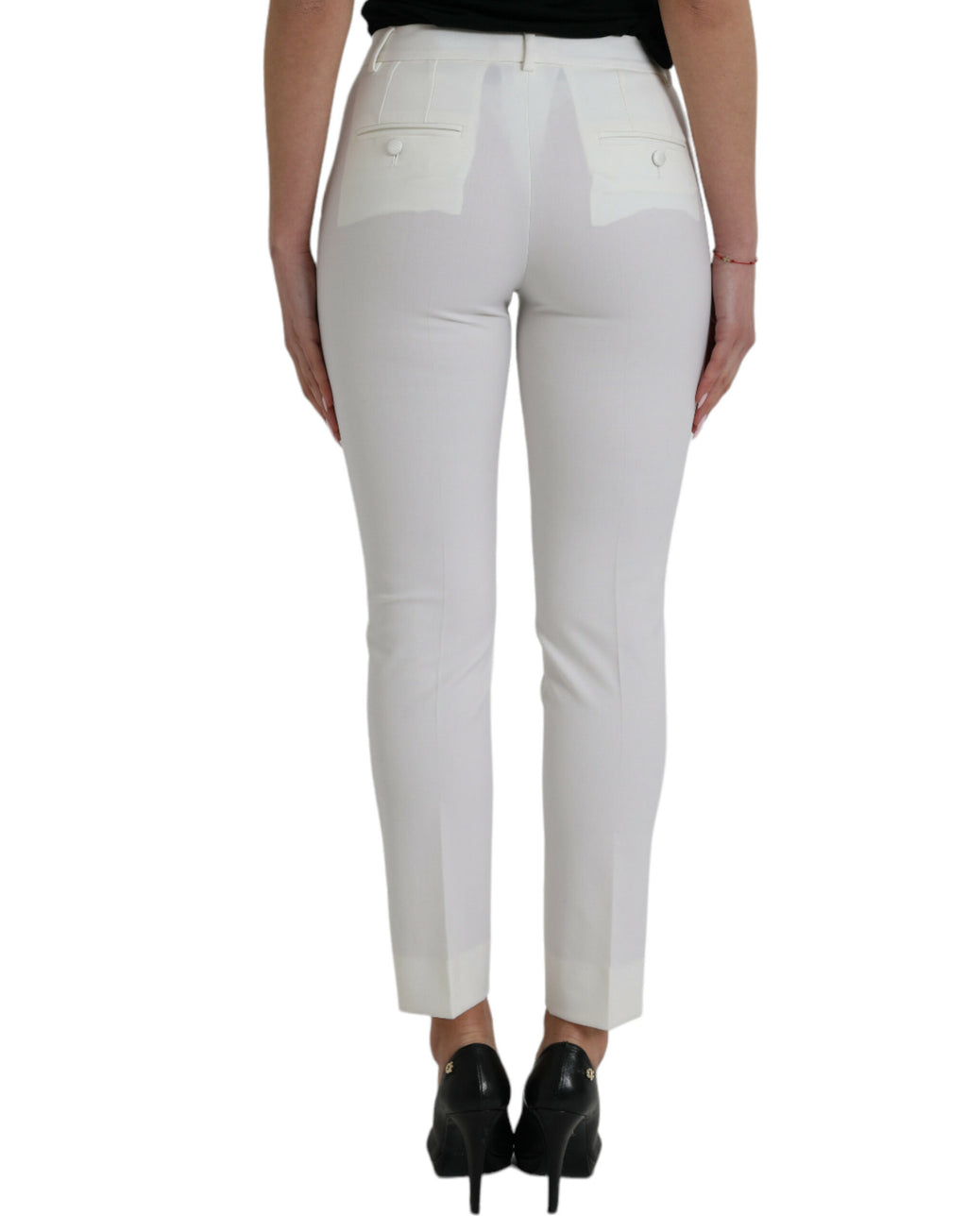 Pantalon en laine blanche Dolce & Gabbana, taille moyenne, coupe tapered, vue de face sur fond neutre.