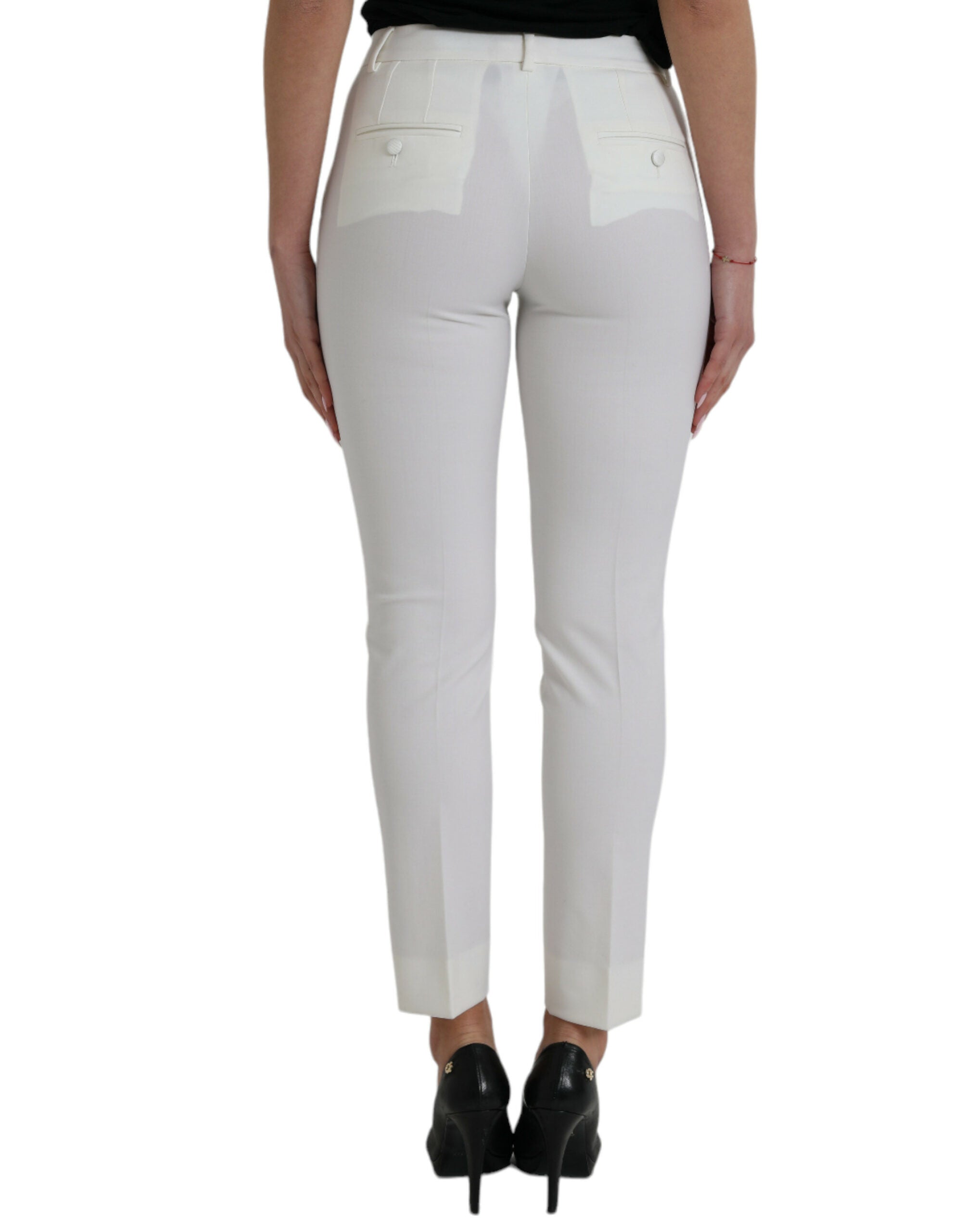 Pantalon en laine blanche Dolce & Gabbana, taille moyenne, coupe tapered, vue de face sur fond neutre.