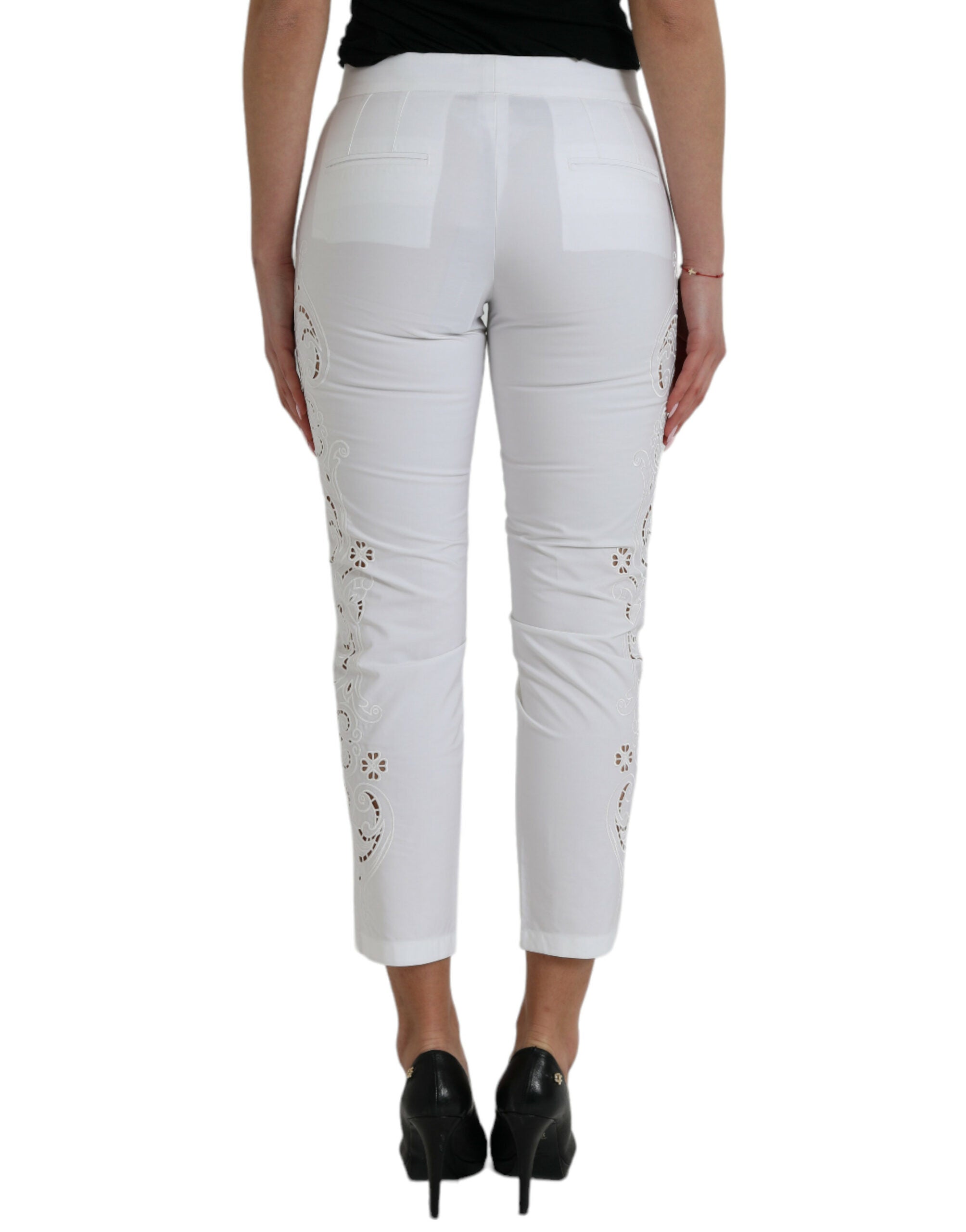 Pantalon court blanc en coton avec découpes, taille mi-haute, de la marque Dolce & Gabbana.