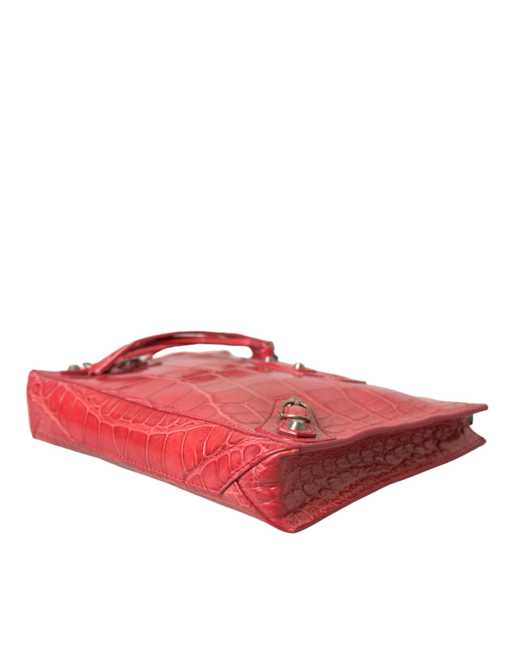 Pochette en cuir exotique rouge de Balenciaga, sac à main classique avec poignée wristlet, visible en gros plan.