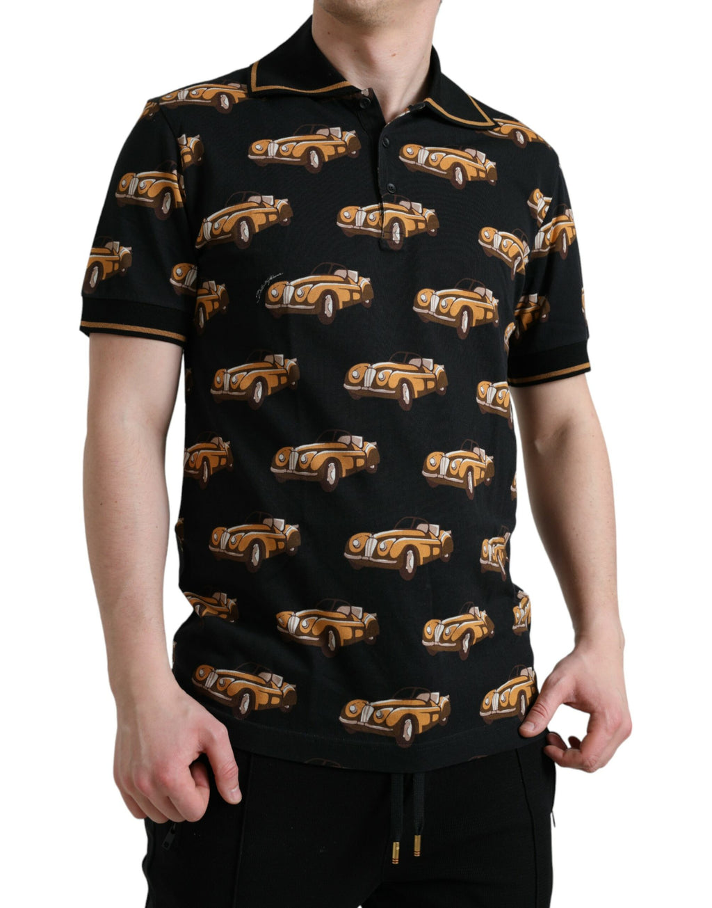 T-shirt polo à manches courtes noir Dolce & Gabbana avec motif voiture imprimé, design élégant et moderne.