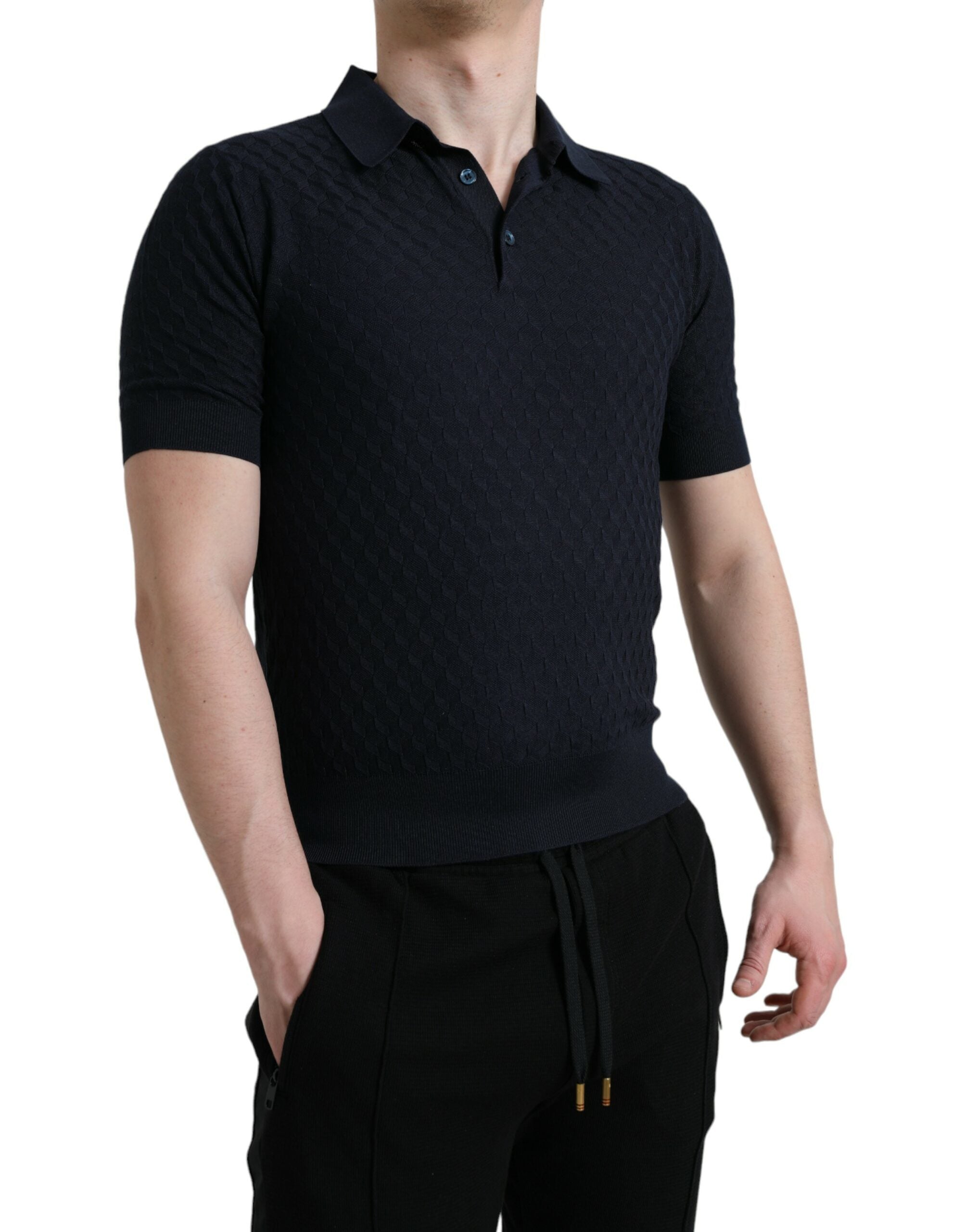 T-shirt polo à manches courtes bleu foncé avec col de marque Dolce & Gabbana, vue de face.