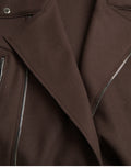 Manteau court en laine marron de style biker par Dolce & Gabbana, avec coupe ajustée et détails en cuir.