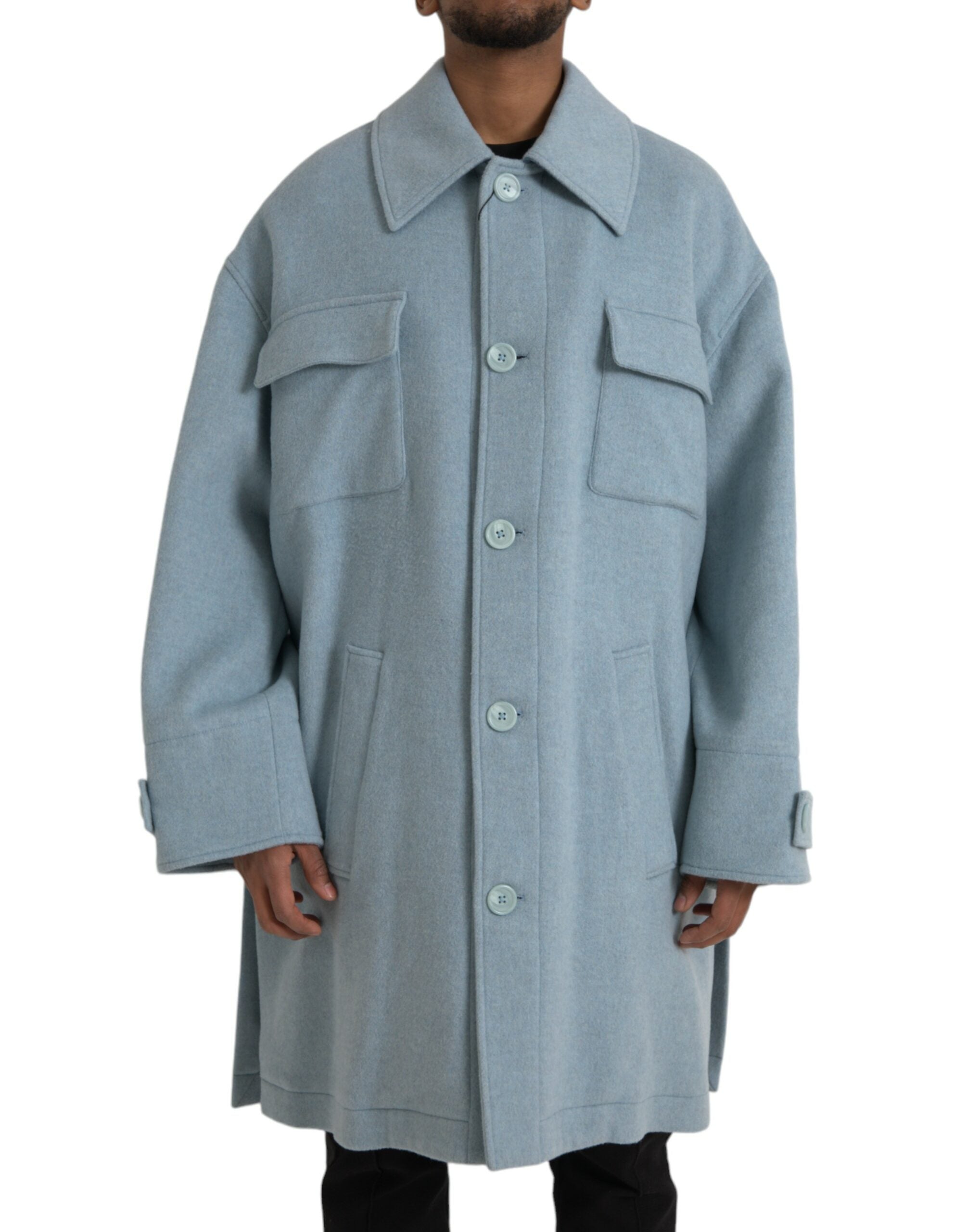 Manteau trench en laine bleu clair Dolce & Gabbana Light Blue avec boutons, vue de face sur un fond neutre.