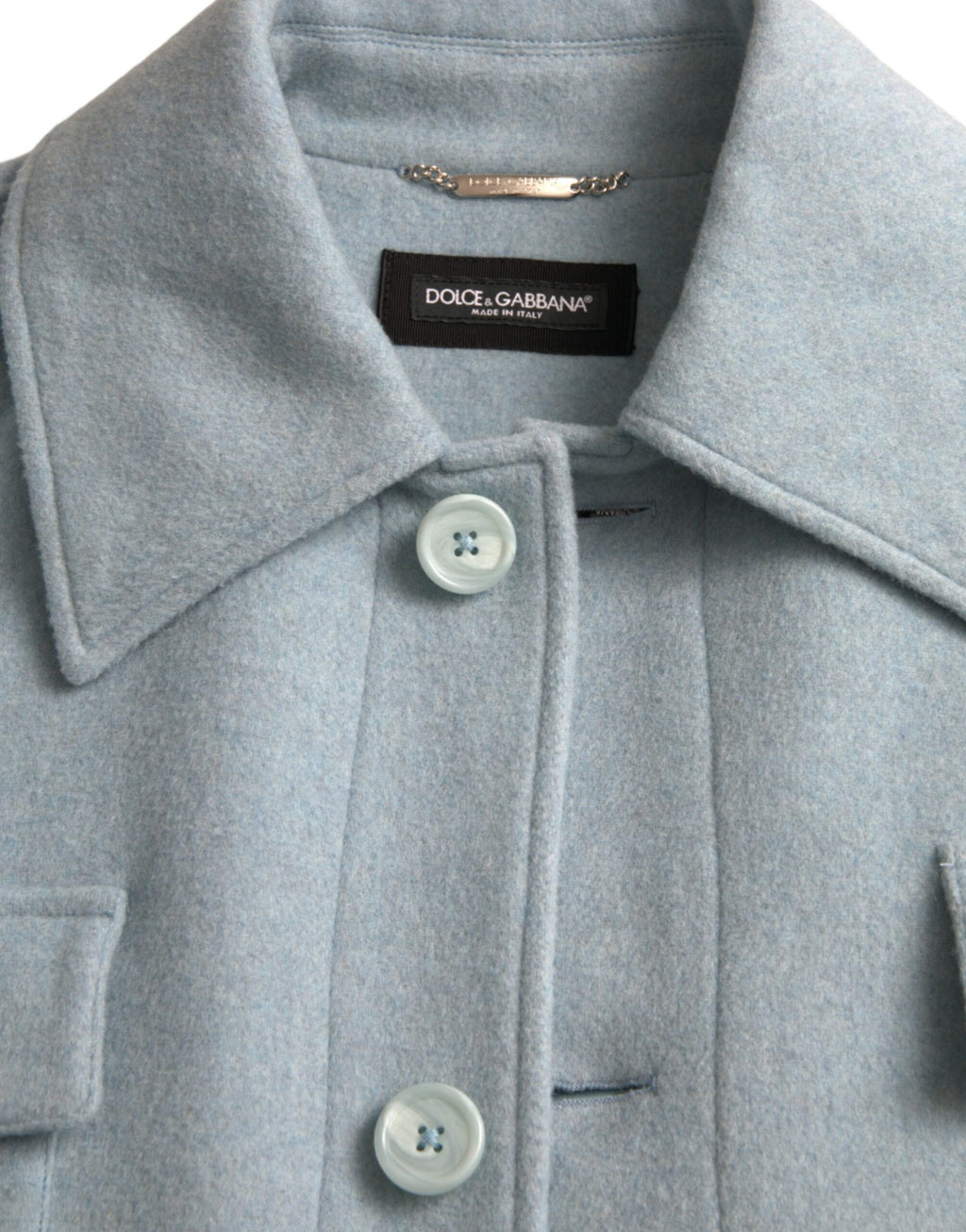 Manteau trench en laine Dolce & Gabbana Light Blue avec boutons, coupe élégante et design sophistiqué pour femme.