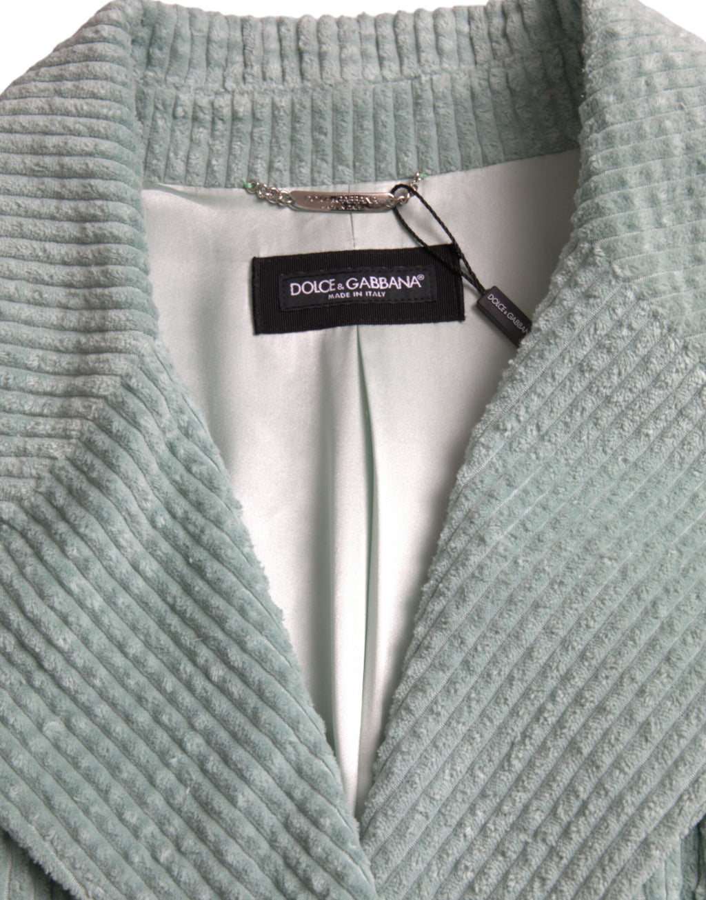 Veste en coton corduroy bleue à double boutonnage de Dolce & Gabbana, mode élégante et sophistiquée.