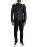 Veste en cuir noir Dolce & Gabbana avec col en fourrure, style biker, détails sophistiqués et coupe élégante.