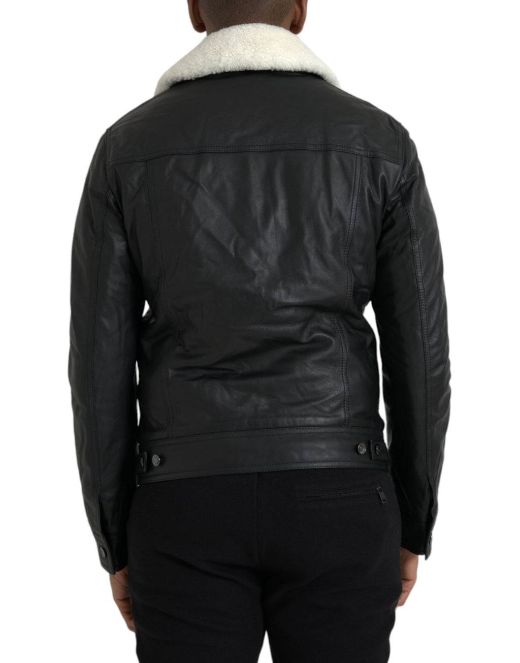 Manteau noir en cuir avec col en fourrure, veste biker Dolce & Gabbana, style élégant et sophistiqué.