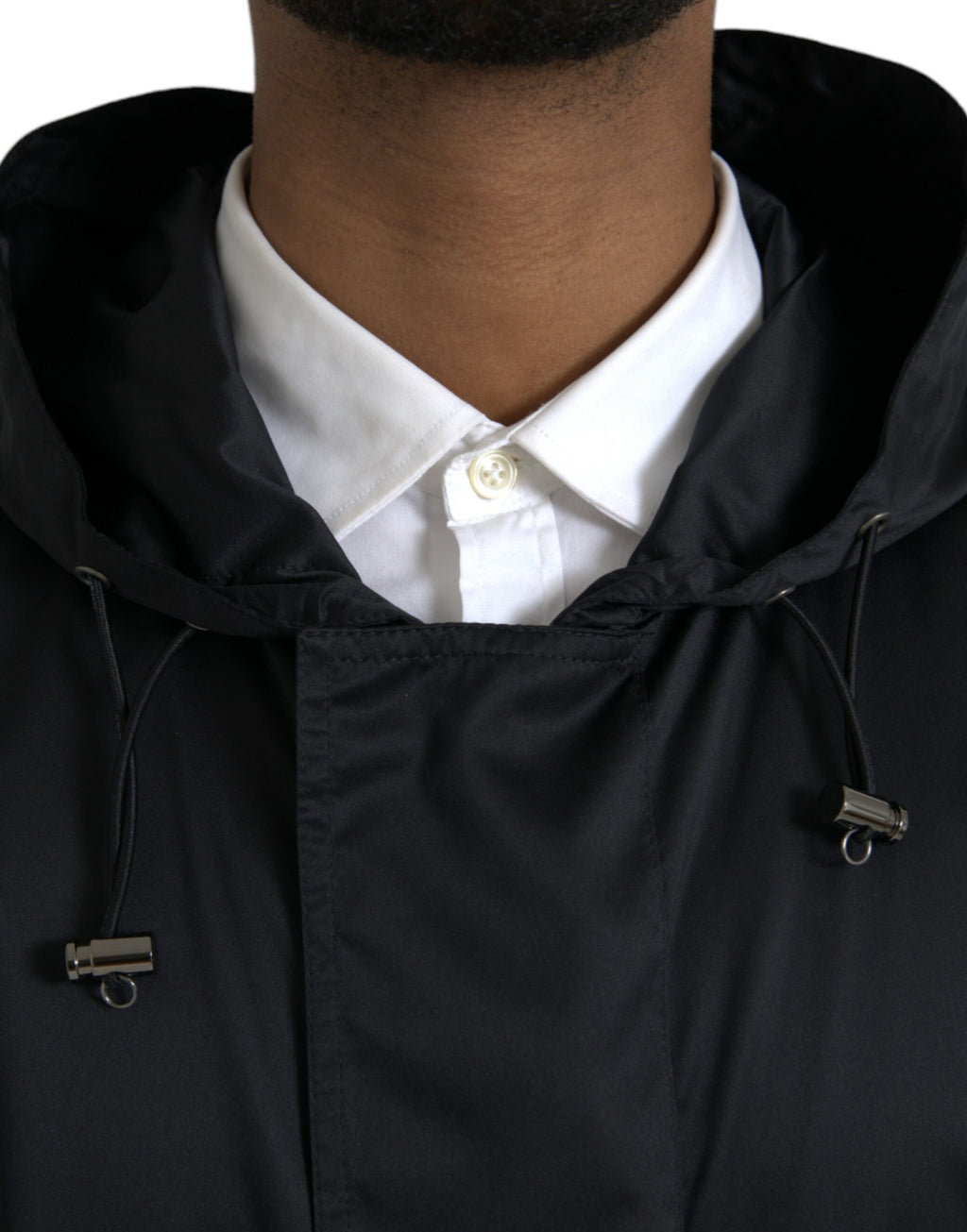 Veste longue coupe-vent noire en polyester avec capuche, style Dolce & Gabbana, pour homme ou femme.