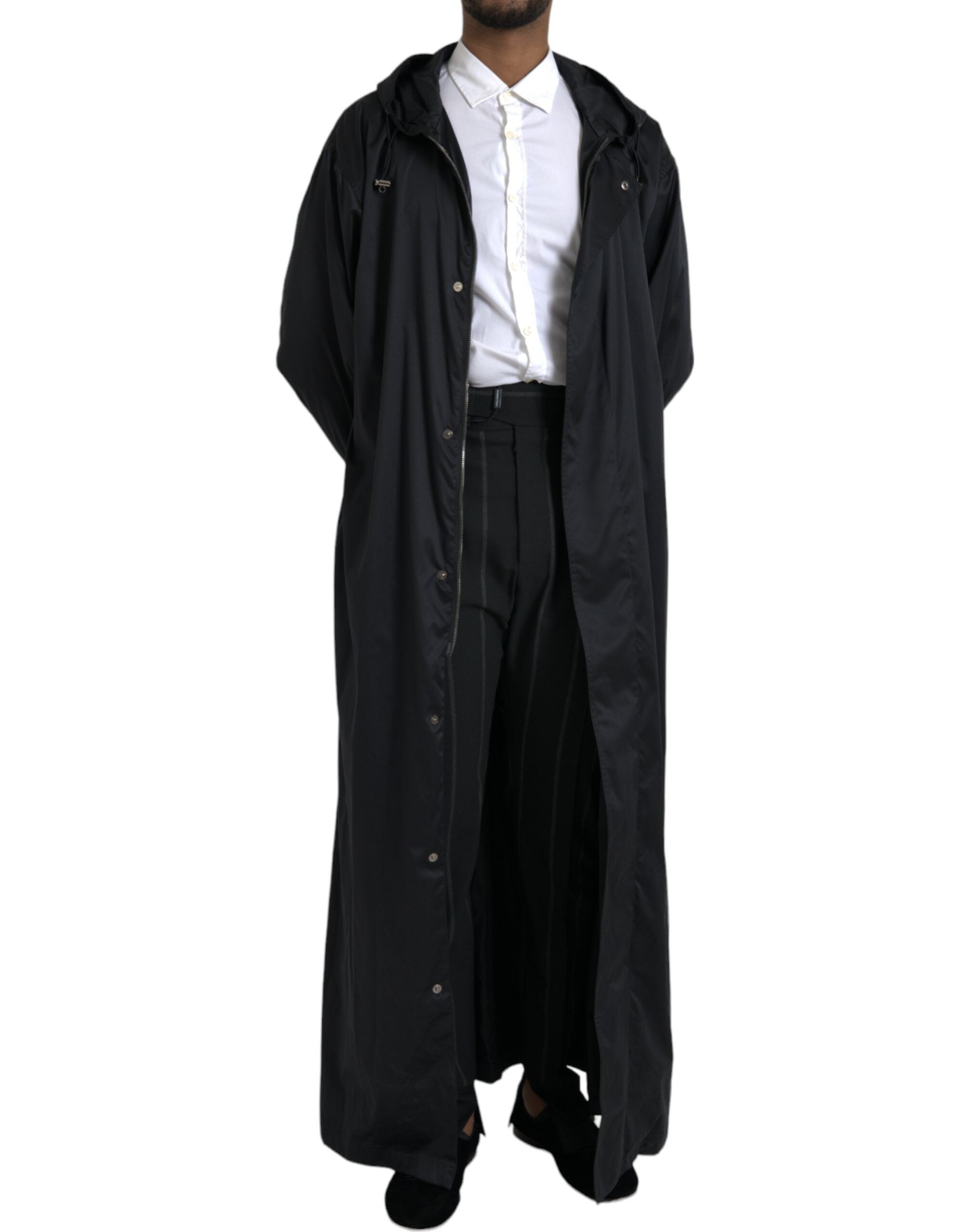 Veste coupe-vent noire en polyester Dolce & Gabbana avec capuche, longue et décontractée, adaptée aux styles urbains et modernes.