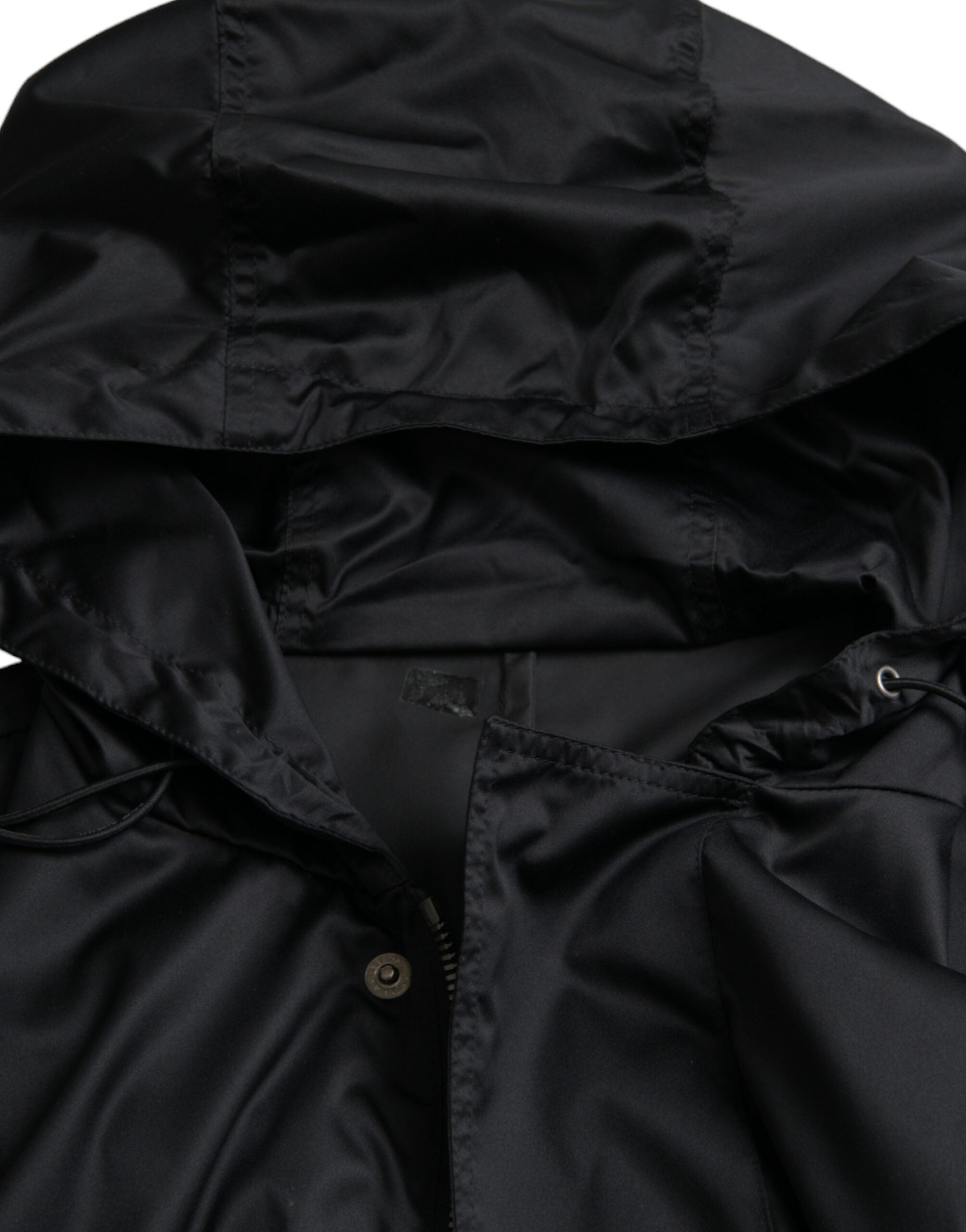 Veste coupe-vent noire en polyester Dolce & Gabbana avec capuche, longue et ajustée, idéale pour le style urbain et la protection contre le vent