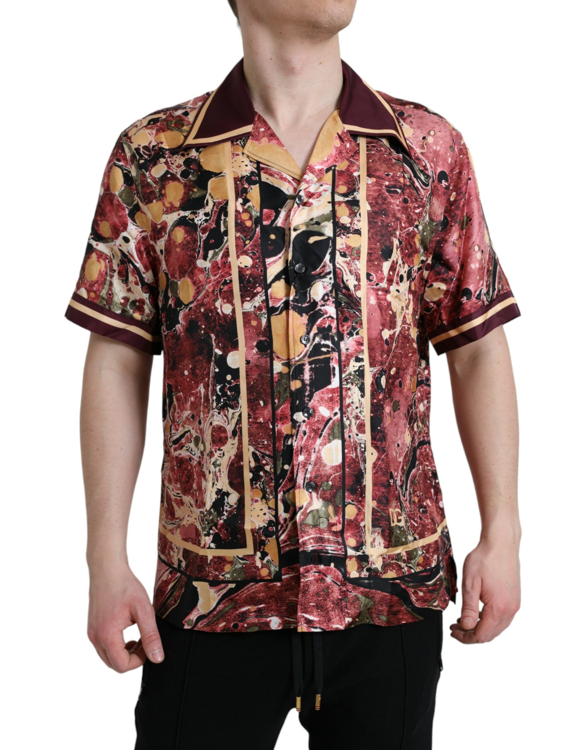 Chemise en soie Dolce & Gabbana à boutons multicolores, élégante et colorée, visible avec détails de couture.