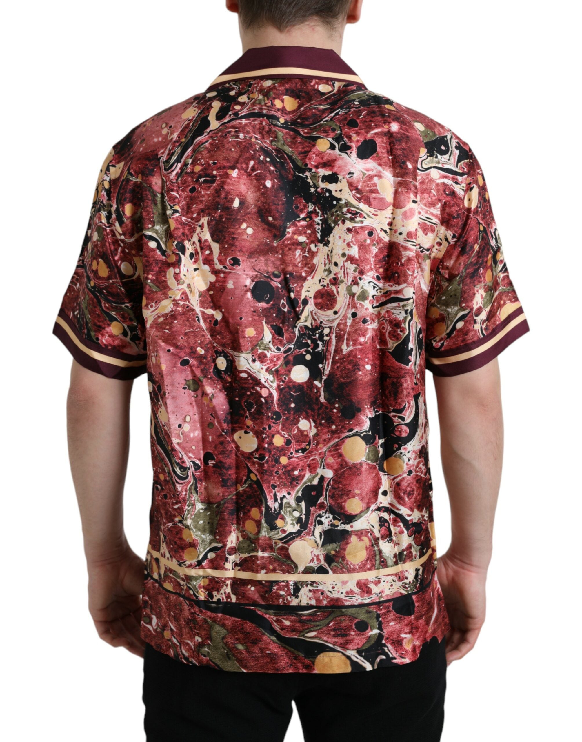 Chemise en soie Dolce & Gabbana à boutons multicolores, style élégant et tissu soyeux visible sur l'image.
