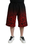 Shorts bermuda en coton à imprimé léopard rouge de Dolce & Gabbana, avec coupe décontractée et design élégant.