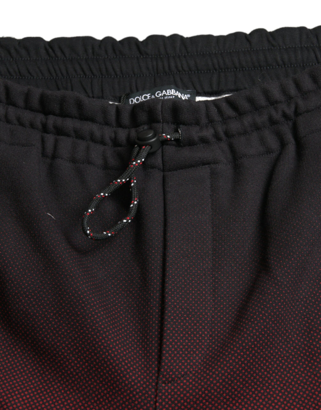 Shorts Bermuda en coton à imprimé léopard rouge de Dolce & Gabbana, avec motif audacieux et style tendance.