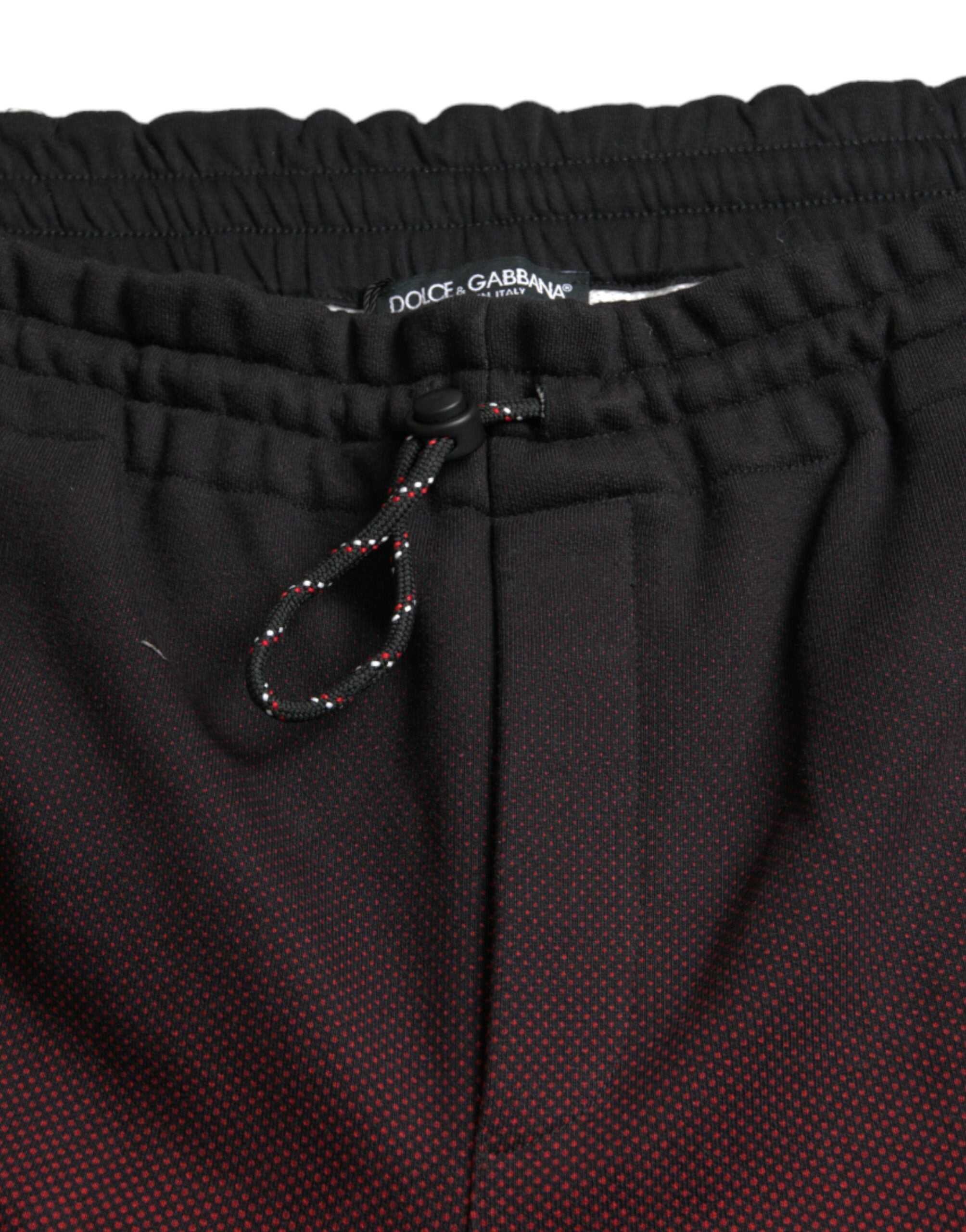Shorts Bermuda en coton à imprimé léopard rouge de Dolce & Gabbana, avec motif audacieux et style tendance.