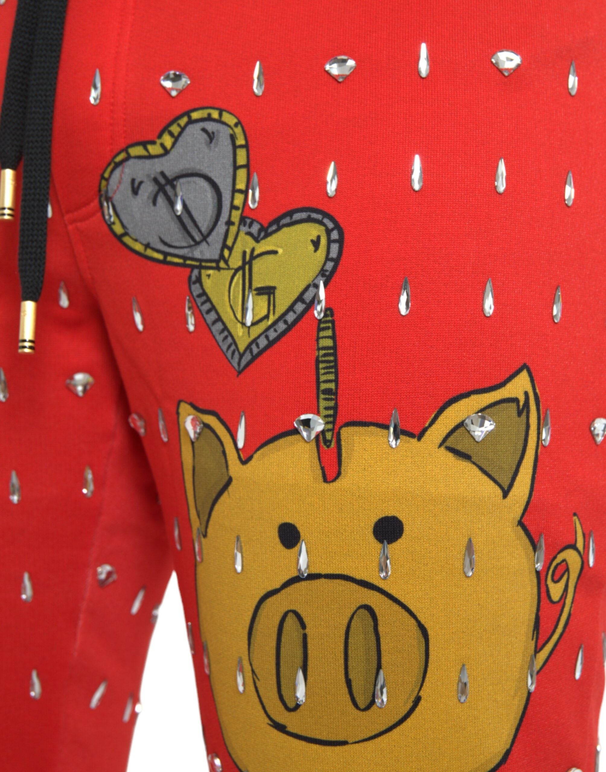 Pantalon jogger rouge Dolce & Gabbana Year Of The Pig, sweatpants confortables avec motifs de cochon chinois.