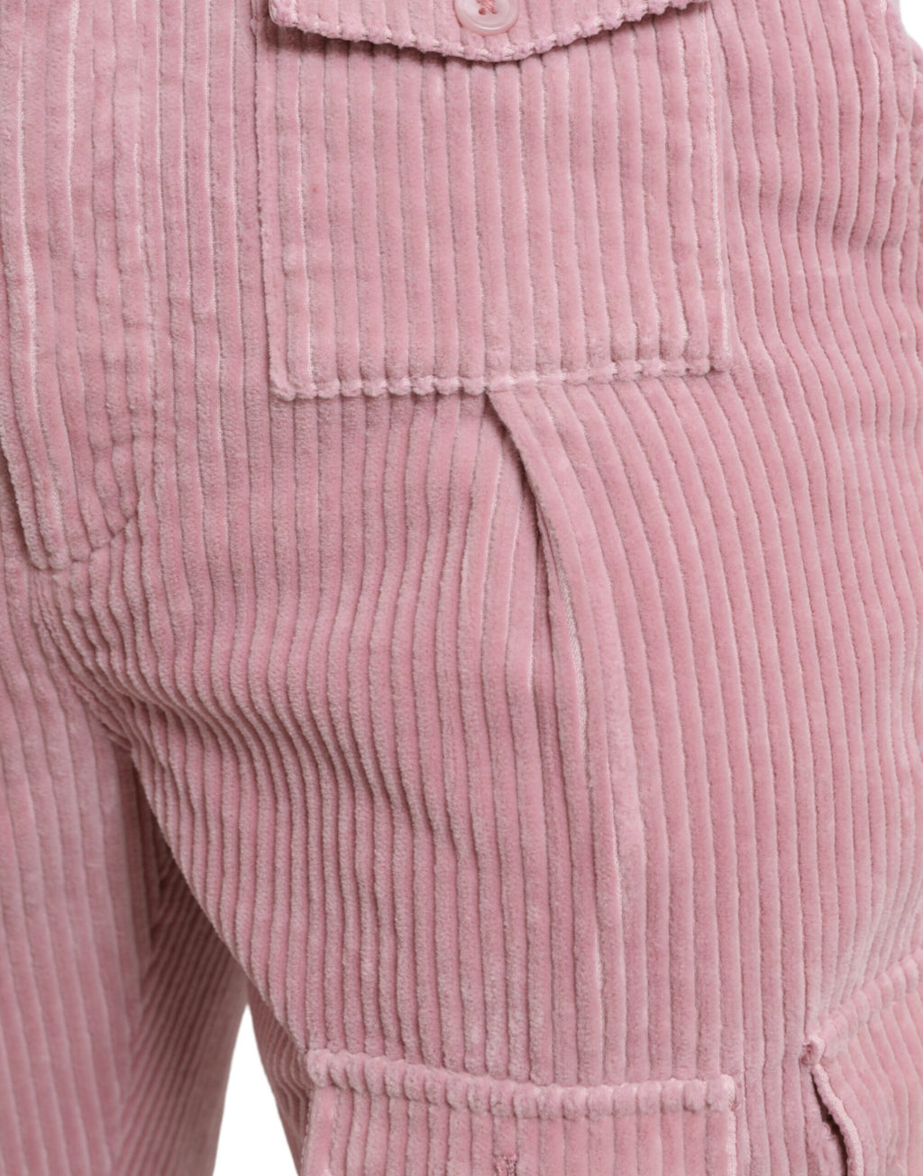 Jeans cargo skinny en velours côtelé rose en coton stretch de Dolce & Gabbana, visibles avec détails de couture et poches.