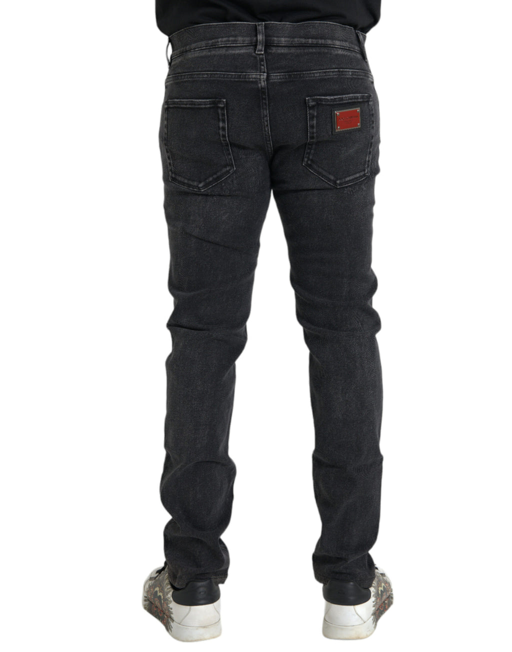 Jeans skinny en denim gris Dolce & Gabbana avec logo, coton extensible, vue de face.