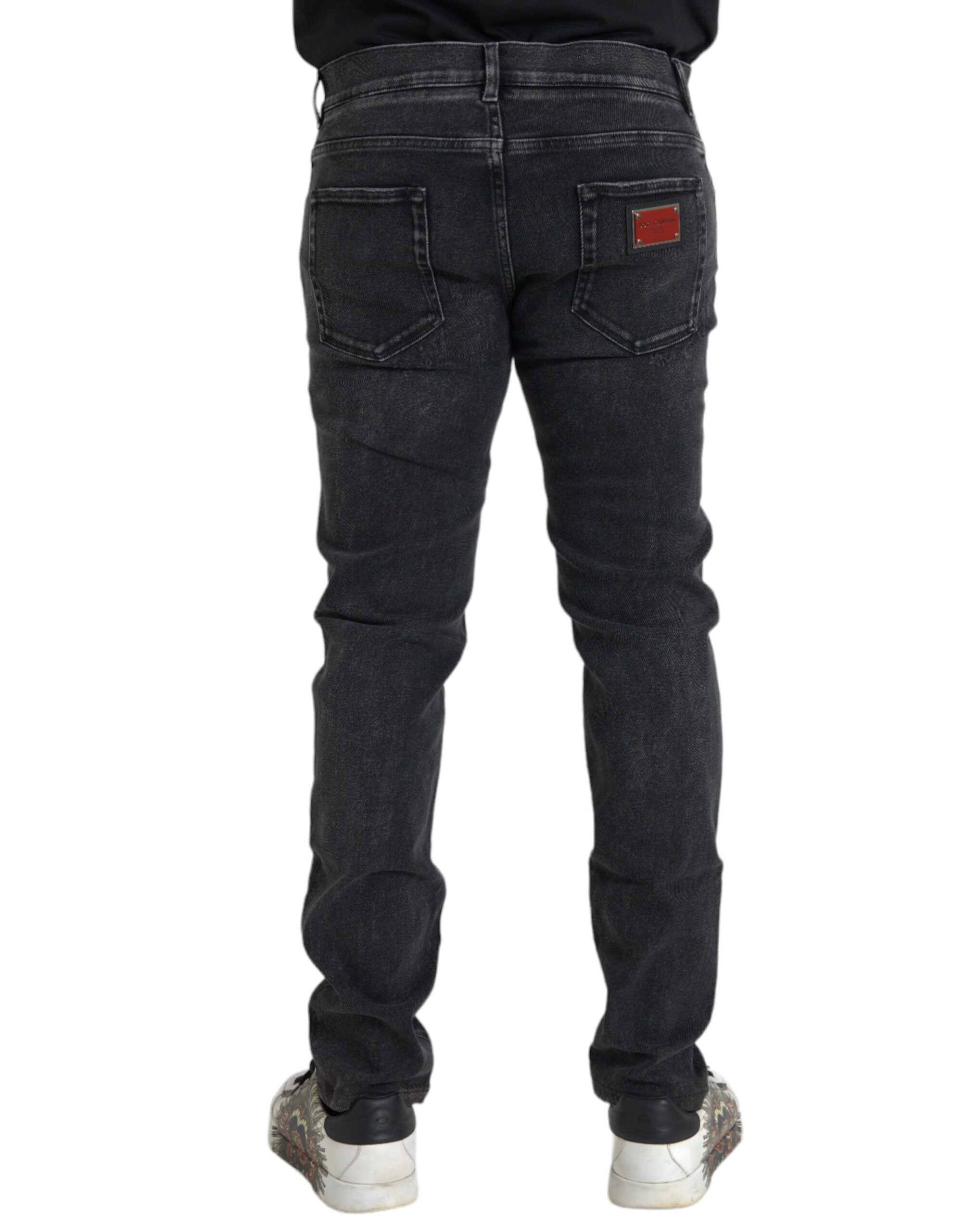 Jeans skinny en denim gris Dolce & Gabbana avec logo, coton extensible, vue de face.
