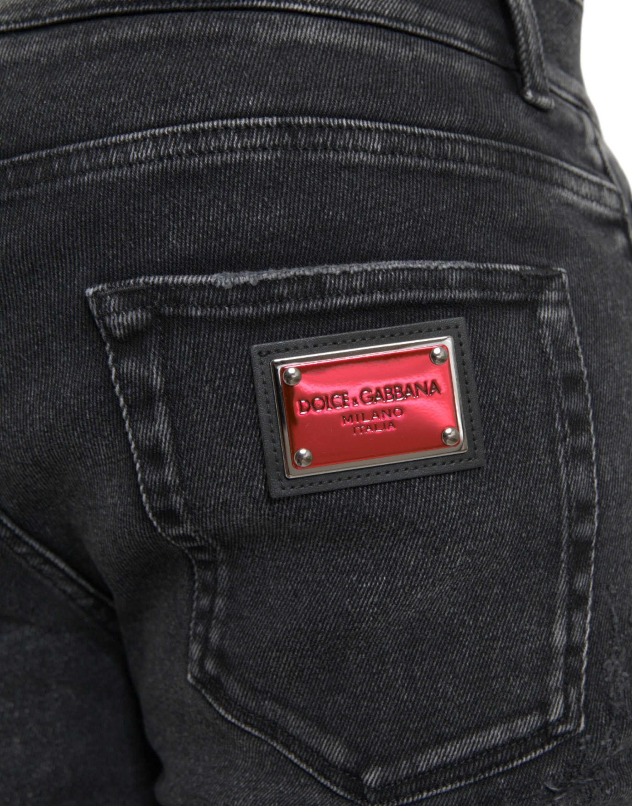 Jeans skinny en denim gris à logo Dolce & Gabbana, en coton stretch, vêtement tendance pour homme ou femme.