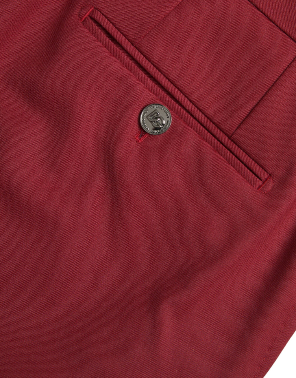 Pantalon homme en laine rouge Dolce & Gabbana, coupe slim fit, pantalon de costume élégant et ajusté.